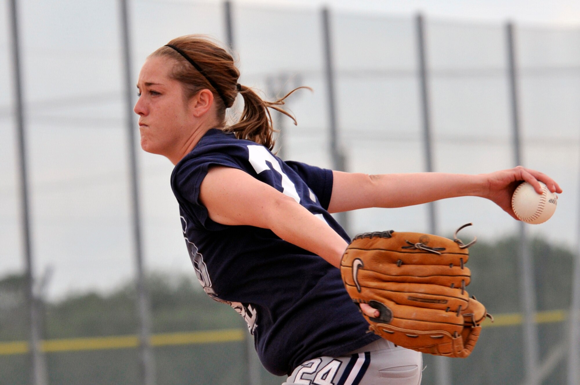 April Forest, pitcher for the Lakenheath Lady Eagles, stares down the batter Aug. 16 at RAF Lakenheath, England. Four women softball teams from all over USAFE competed in the championships, ending with Lakenheath on top. (U.S. Air Force photo by Airman Perry Aston)