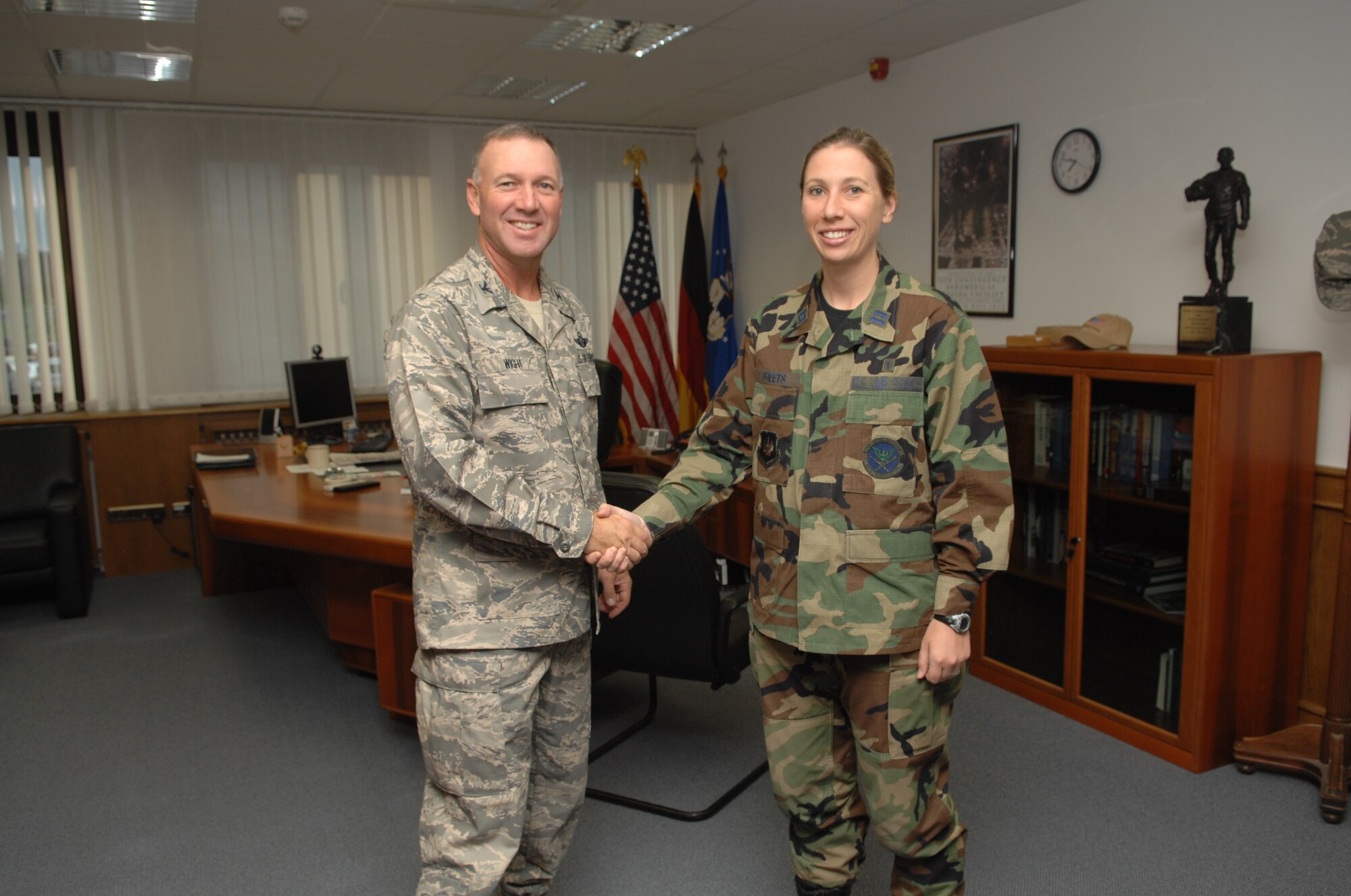 Captain Christina Sheets, from the 52nd Dental Squadron, participates in the commander’s shadow program, shadowing Colonel Lee Wight, 52nd Fighter Wing Commander, August 20, 2008, Spangdahlem Air Base, Germany.  Capt. Sheets is the dental laboratory flight commander and chief prosthodontics. (photo by Airman 1st Class Allen Pollard)