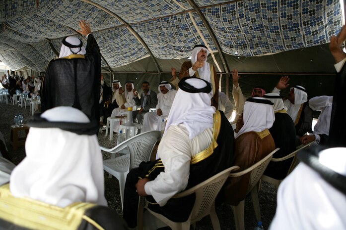 Local sheikhs or tribal leaders from Karmah, Iraq, held a meeting with Task Force 1st Battalion, 3rd Marine Regiment, Regimental Combat Team 1, Aug. 20 at the Iraqi Army Base located in the city. These local meetings were halted for almost two months because of a suicide vest attack that killed several local leaders and three Marines. (Official Marine Corps photo by 1st Lieutenant Andrew W. Duncan)