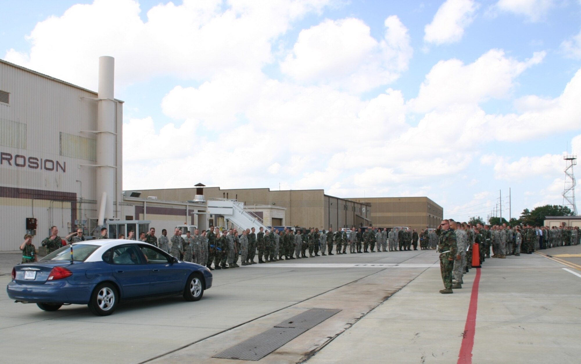 Brig. Gen. Lori Robinson made her final departure from the flightline through a road lined with Airmen from the 552nd Maintenance Group, who saluted her car as she drove off soaked in water and champagne. (Photo Courtesy of 2nd Lt. Kinder Blacke) 