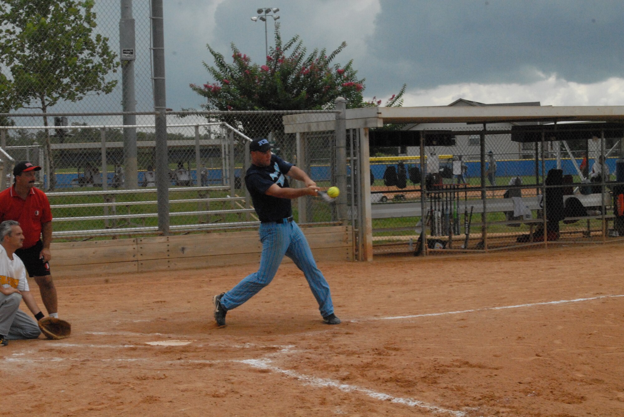 Staff Sgt. Matt Eckert, 43rd Aeromedical Evacuation Squadron and member of the Pope Air Force Base All-Star Softball Team, drives a pitch to left field against the Fort Detrick, Md. team August 16 at the Military Softball World Series in Kissimmee, Fla. (U.S. Air Force Photo by 2nd Lt. Chris Hoyler)