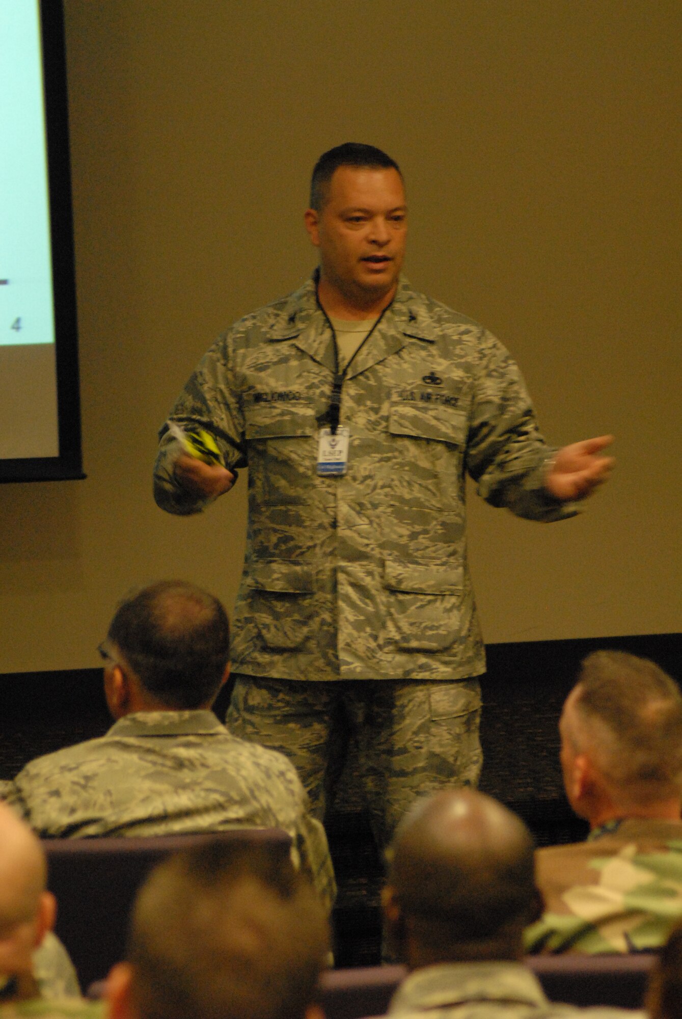 Col. Robert Miglionico, Logistics Standardization and Evaluations Program Inspection Team Chief, briefs the LSEP inspection team and 43rd Airlift Wing leadership Aug. 11. Two groups were inspected; the 43rd Maintenance Group received an Outstanding rating while the 43rd Mission Support Group earned an Excellent rating. (U.S. Air Force Photo by Staff Sgt. Jon LaDue)