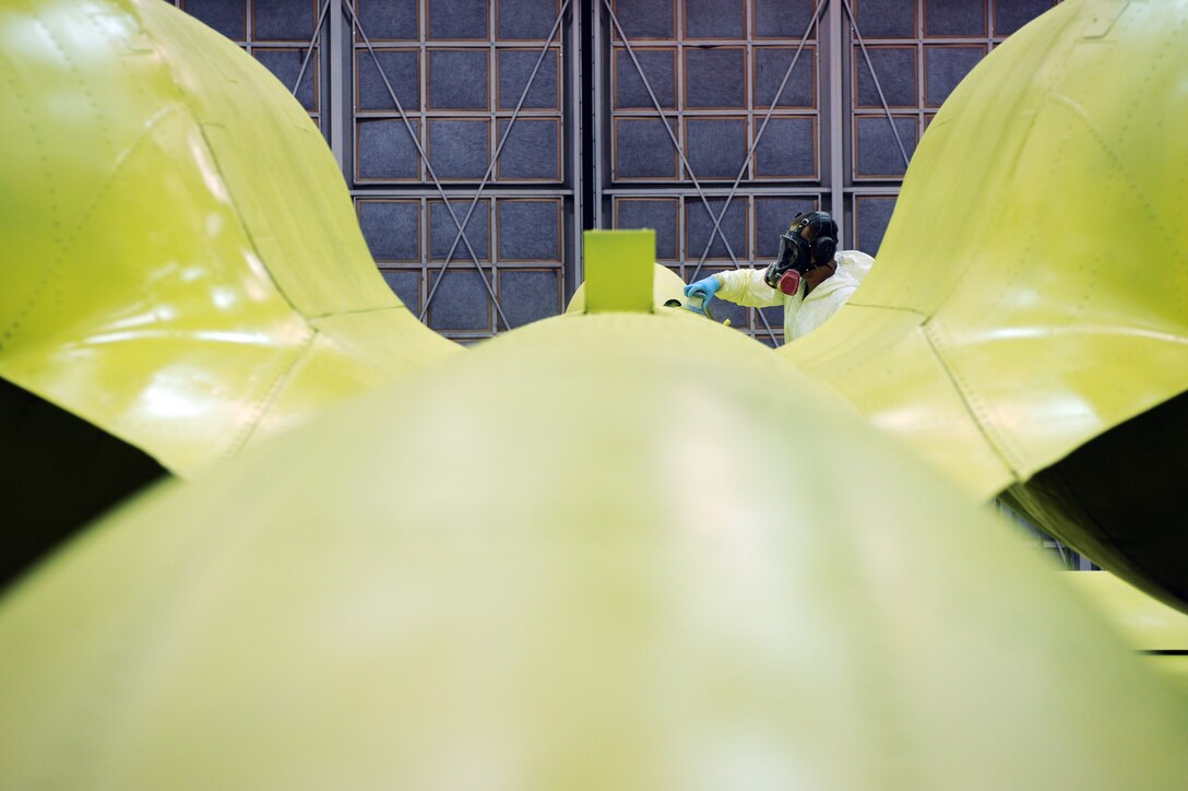 Airman 1st Class Timothy Coulson sands down the primer on an A-10 Thunderbolt II Aug. 20 at Eielson Air Force Base, Alaska, to prepare it for its base coat of paint. Members of the 354th Maintenance Squadron fabrication shop are working on restoring this A-10 to be a static display in the base's Heritage Park. This aircraft will be a permanent reminder of the 355th Fighter Squadron's presence here before its deactivation in 2007.  (U.S. Air Force photo/Airman 1st Class Jonathan Snyder) 