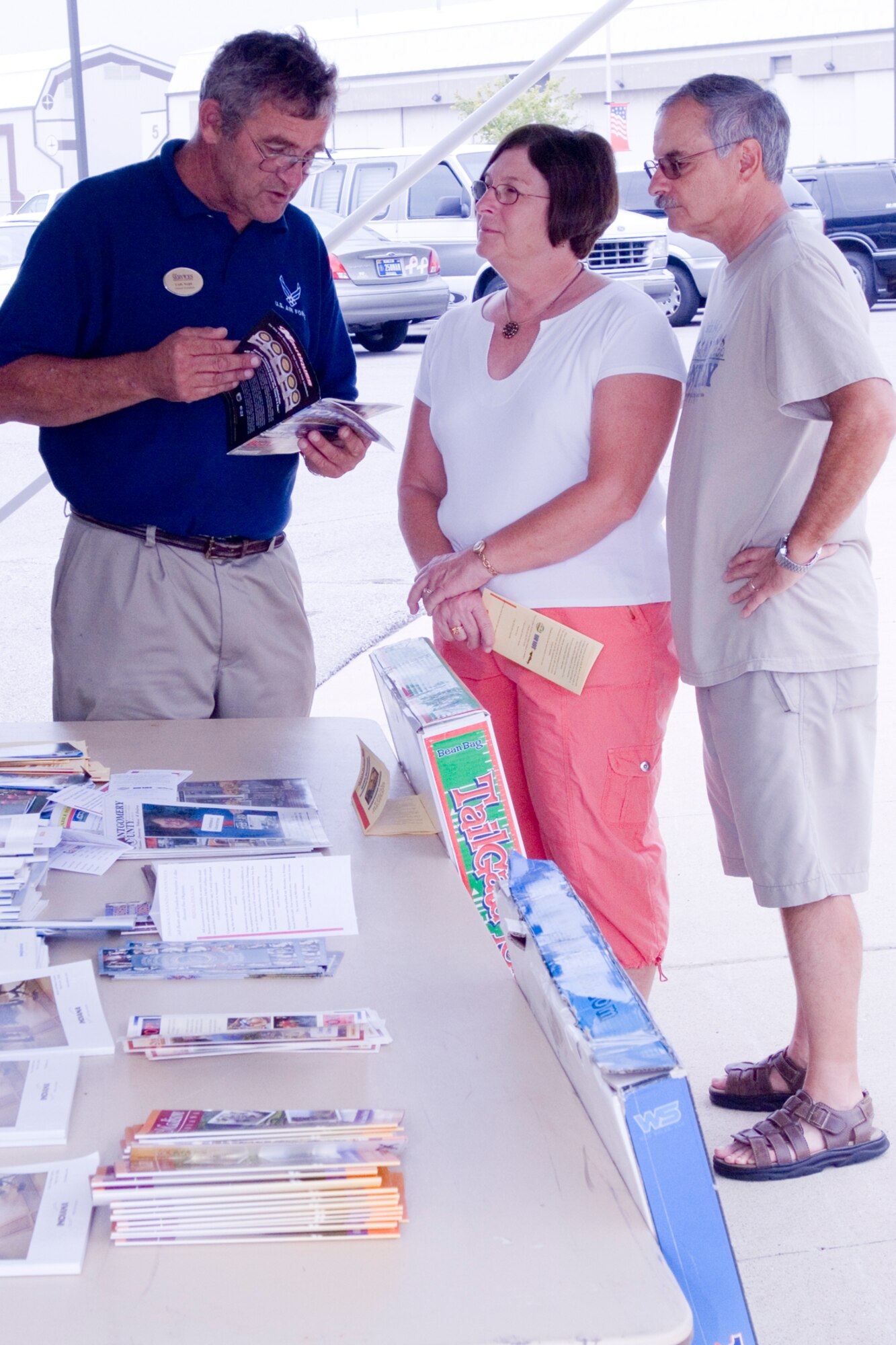 GRISSOM AIR RESERVE BASE, Ind., -- Carl Wade, outdoor recreation services, discusses camper rental options with area retirees. Grissom hosted the 2nd Annual Military Retiree Appreciation Day in August and treated retirees to a luncheon and information fair and gave them an opportunity to shop at a commissary case lot sale. (U.S. Air Force photo/Tech. Sgt. Doug Hays)