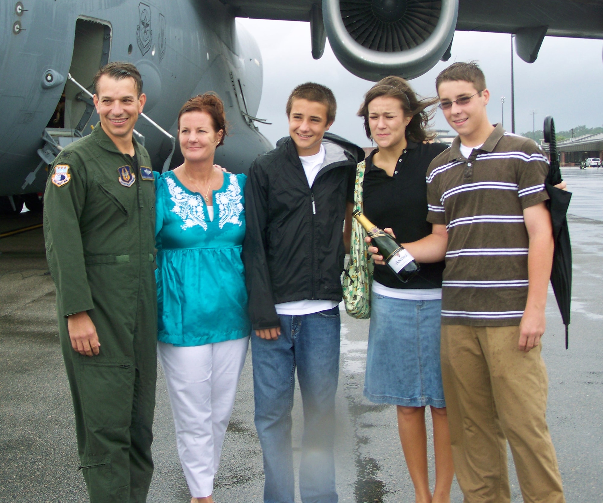 315th Airlift Wing Vice Commander Colonel Mark Bauknight's family was on hand to congratulate him on completing his final flight.  Col. Bauknight will retire this Sunday after spending 23 years in the Air Force. (U.S. Air Force photo/ Capt. Wayne Capps)