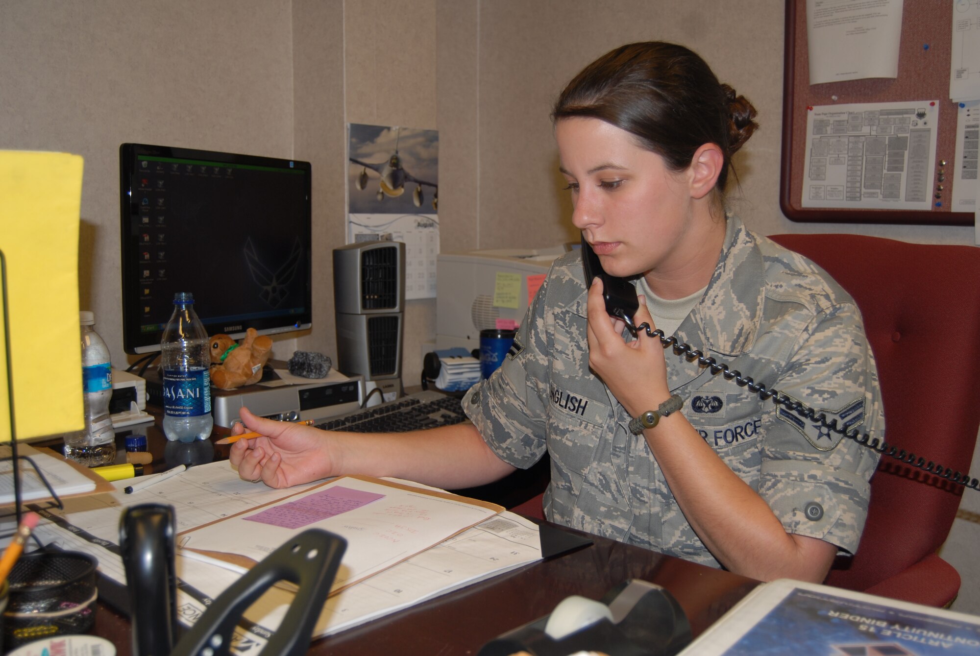 Airman 1st Class Rebecca English, 43rd Airlift Wing, reviews Unfavorable Information Files. A UIF can be issued if an Airman gets a Letter of Reprimand, Letter of Counseling or an Article 15. Airman English ensures that all of the information needed is in those files. (U.S. Air Force Photo by Emily Smith)