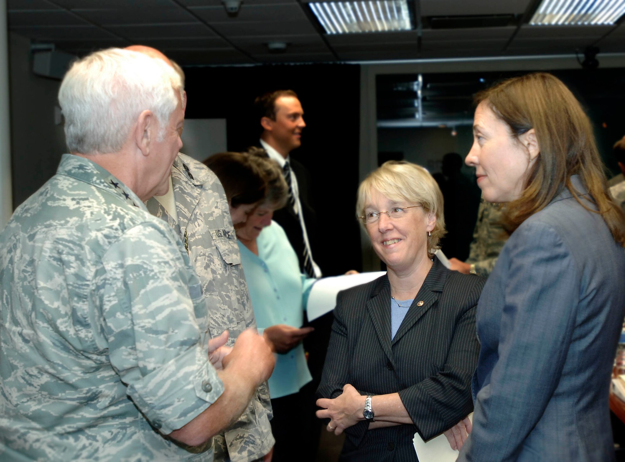 FAIRCHILD AIR FORCE BASE, Wash. – Patty Murray and Maria Cantwell, U.S. Senators from Washington State, converse with Gen. Arthur Lichte, Air Mobility Command commander, here Aug. 19. (U.S. Air Force photo / Staff Sgt. JT May III)