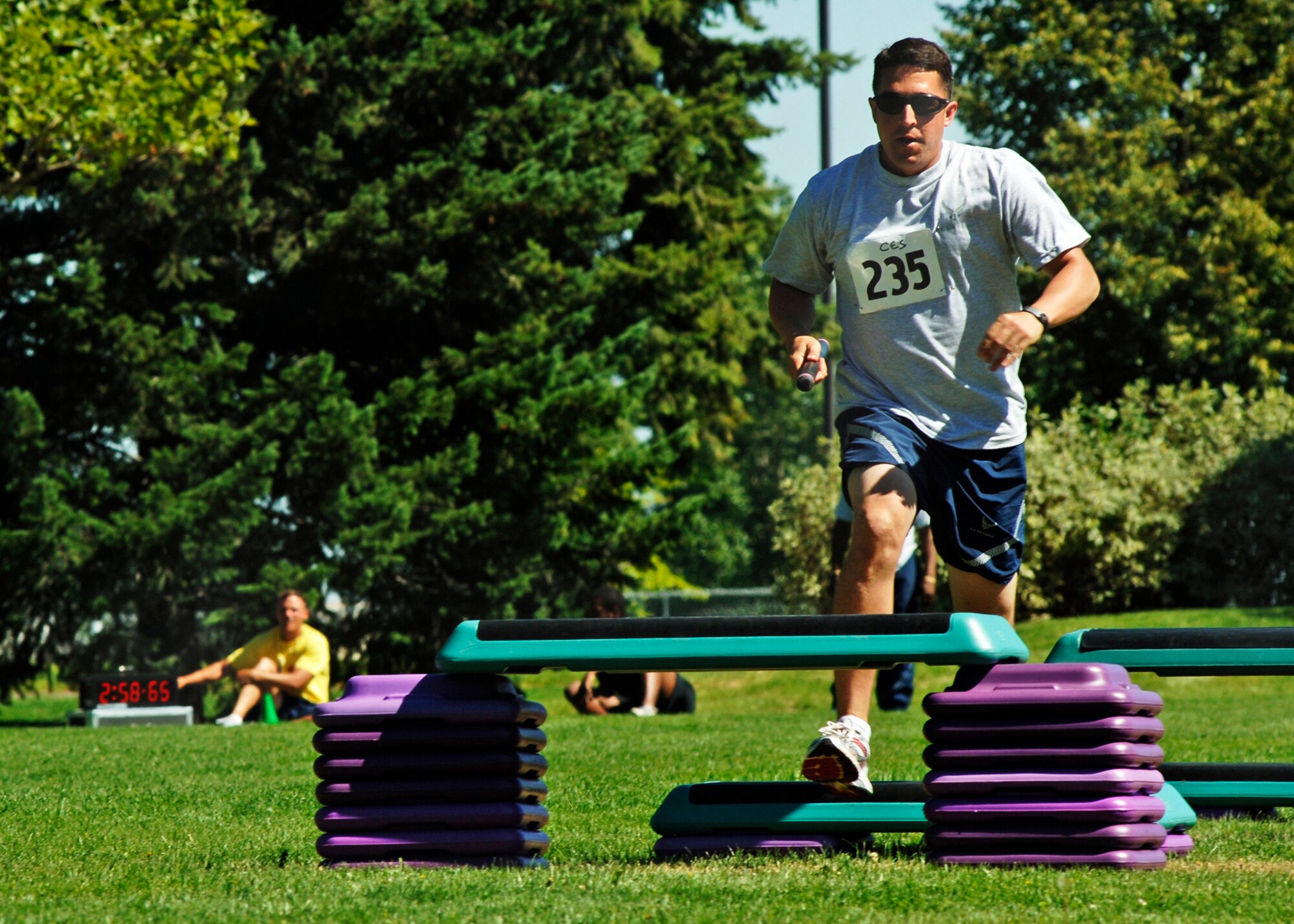 FAIRCHILD AIR FORCE BASE, Wash. – Tech. Sgt. Eric Meza, 92nd Civil Engineering Squadron electrical systems crashman, races against the clock during the relay portion of the Commander’s Challenge at Miller Park Aug. 15. The 92nd Security Forces won the obstacle event, catapulting them in the final rankings to fourth. (U.S. Air Force photo / Airman 1st Class Melissa Barnett)