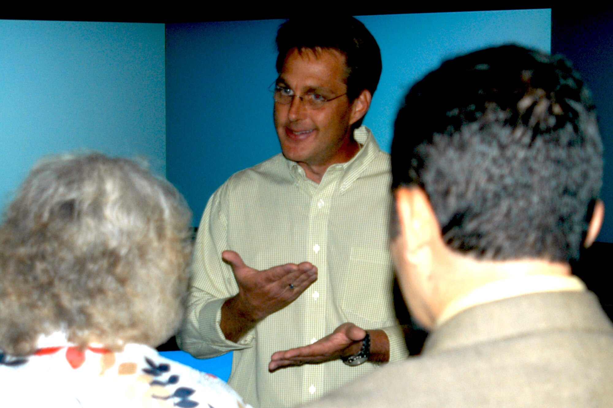 GRISSOM AIR RESERVE BASE, Ind., -- Robert Moore, an air traffic controller assigned to the 434th Operations Support Squadron, briefs congressional staffers on the air traffic control simulator. The staffers got a chance to try their hand at controlling aircraft in the simulator during a visit to the base Aug. 21. (U.S. Air Force photo/Capt. Kelly Howard)
