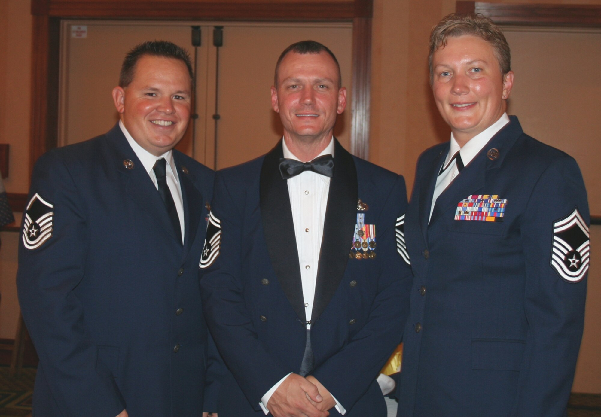 Master Sgt. Richard Champ, Senior Master Sgt. Robert Wilson and Senior Master Sgt. Angela Varvel attend the Awards Banquet while at McGee Tyson, Tenn. for the NCOAGA 40th anniversary conference.