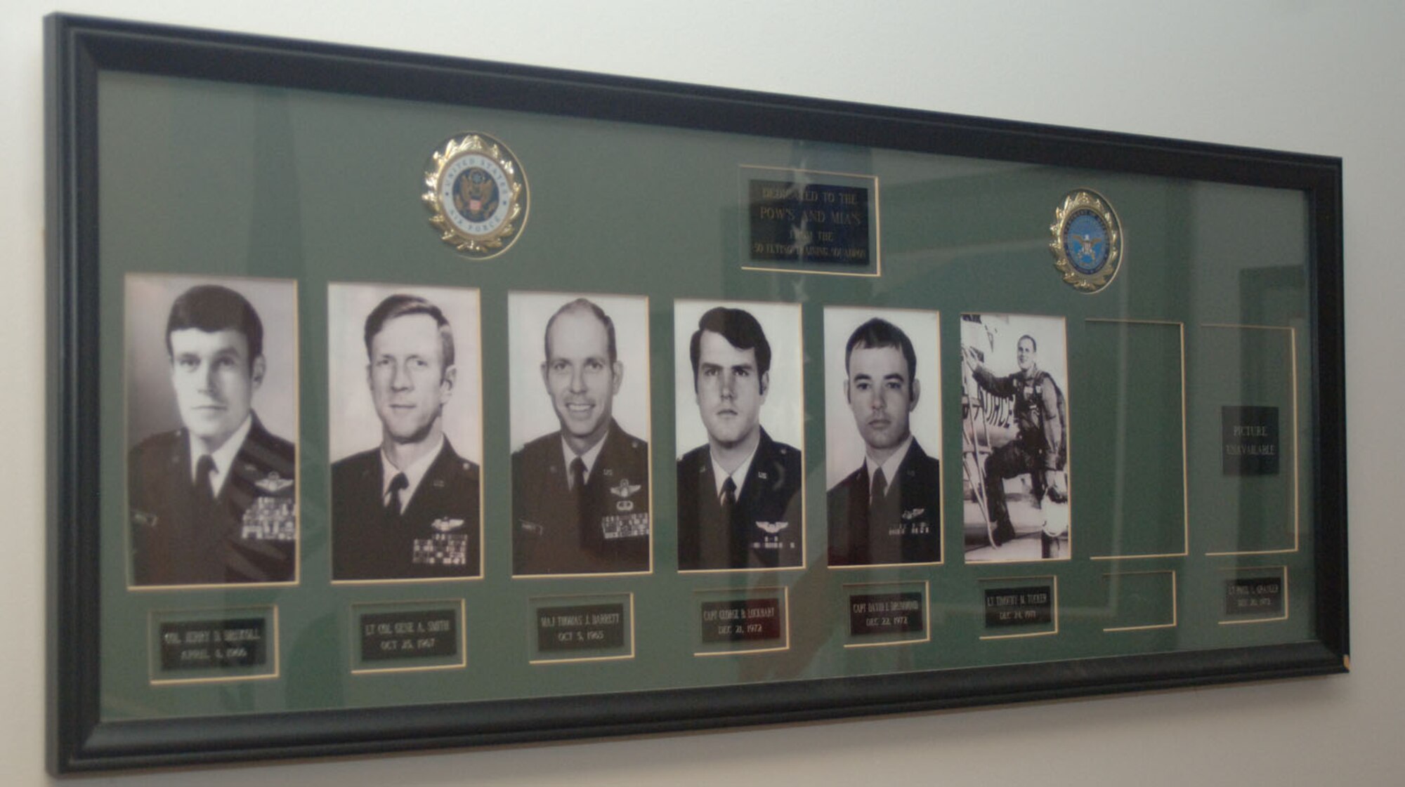 This display is dedicated to the POW's and MIA's of the 50th Flying Training Squadron. These individuals include Lt. Col. Gene Smith and Capt. George Lockhart. (U.S. Air Force photo by Senior Airman Danielle Hill)