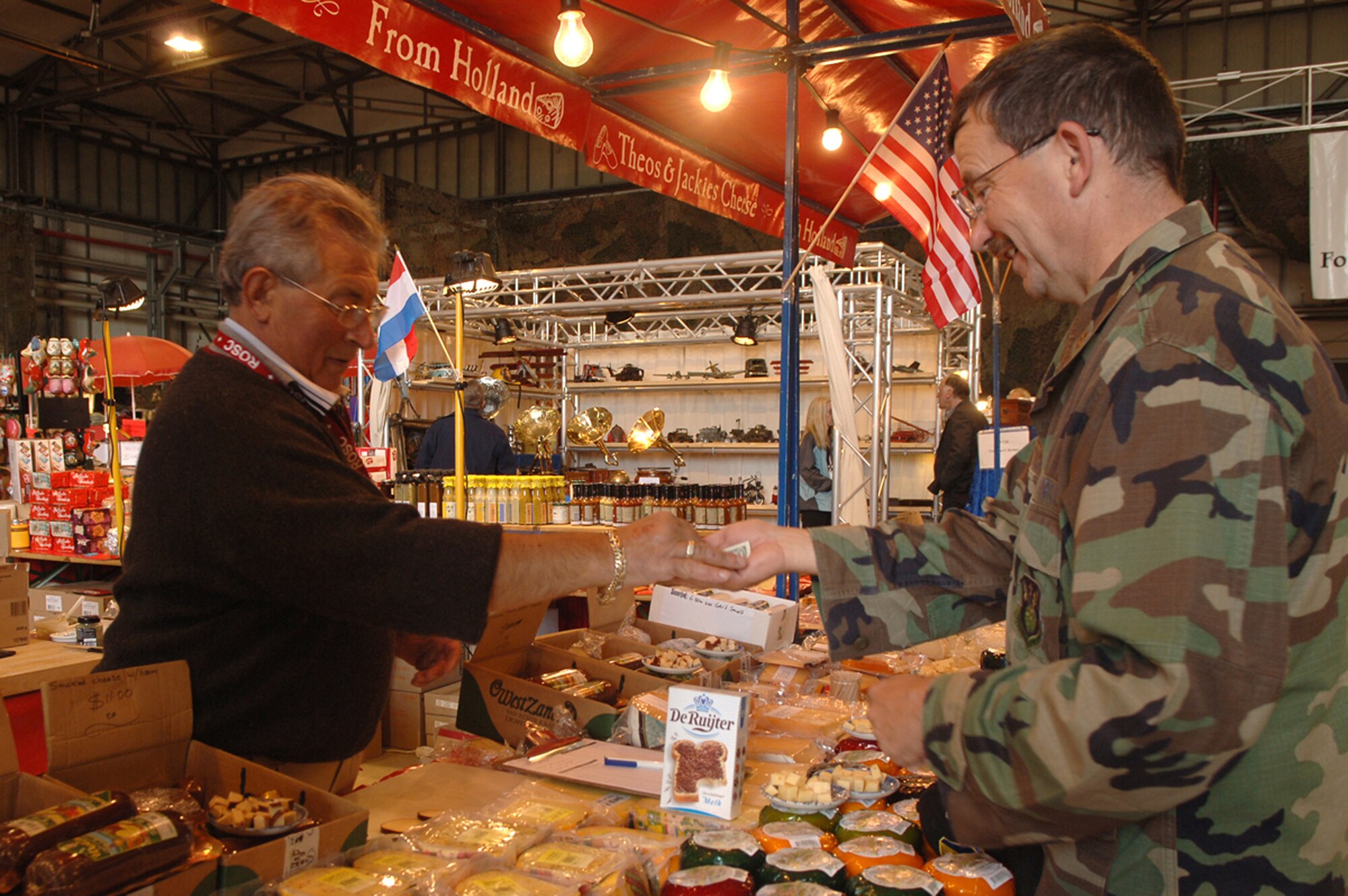 Major Gary Bertsch, 86 Airlift Wing, purchases sprinkles from a vendor at the bazaar, Sept. 13, 2008. (U.S. Air Force Photo by Airman 1st Class Kelly LeGuillon) (Released)  