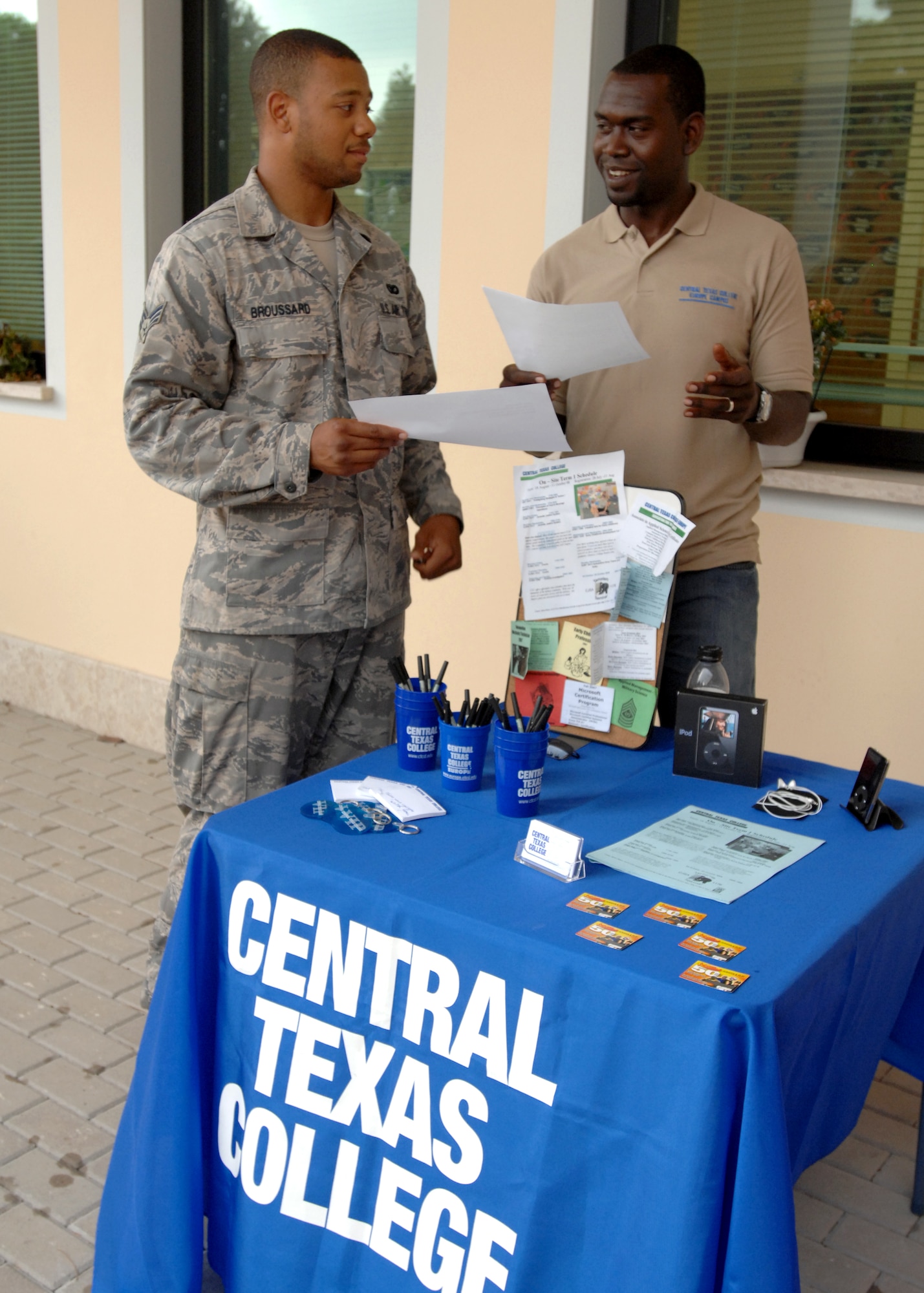 AVIANO AIR BASE, Italy --  Robert Humes tells Senior Airman Aaron Broussard about how Central Texas College can help him further his education Aug.8 at the Aviano Education Center, August 8th.  Central Texas College has many on-site degree plans to help people of the Aviano Community obtain Associate Degrees.  (U.S. Air Force photo/Airman 1st Class Tabitha M. Mans)