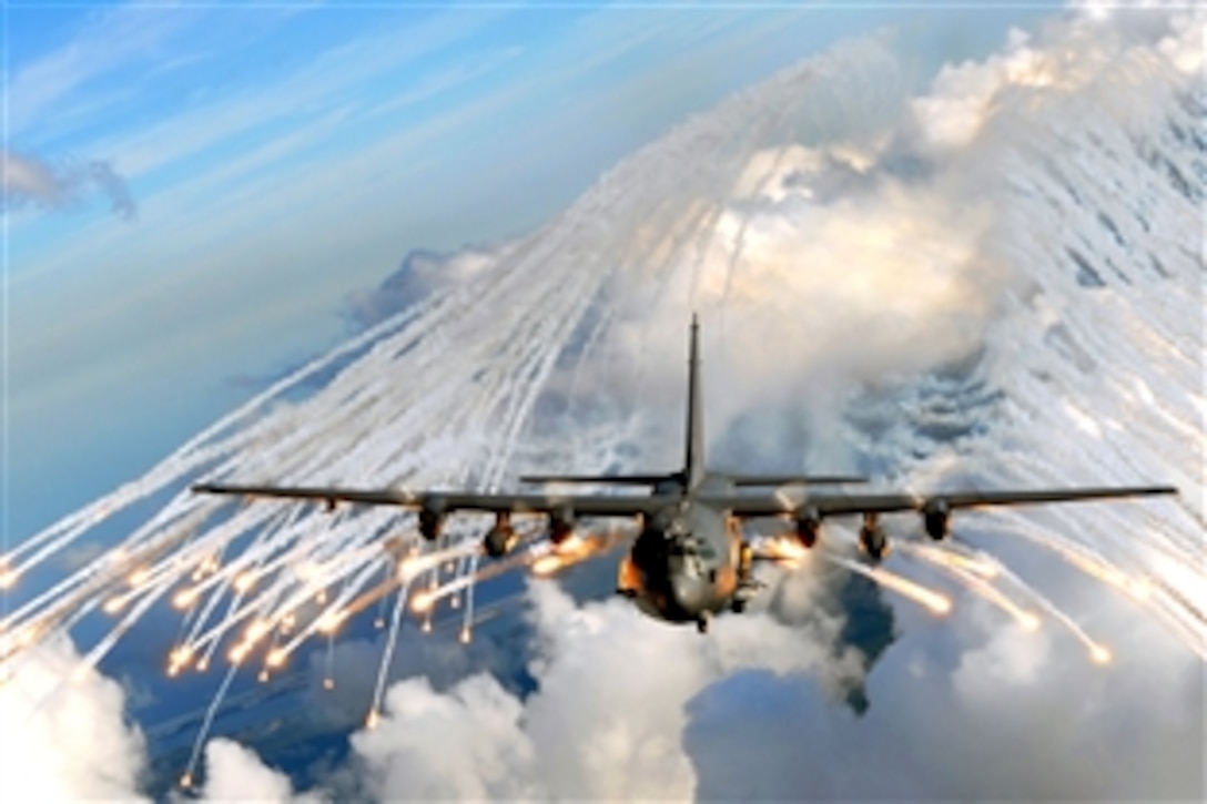 A U.S. Air Force gunship jettisons flares over an area near Hurlburt Field, Fla., Aug. 20, 2008. The flares are designed to intercept heat-seeking missiles that can track aircraft during real-world missions. 
