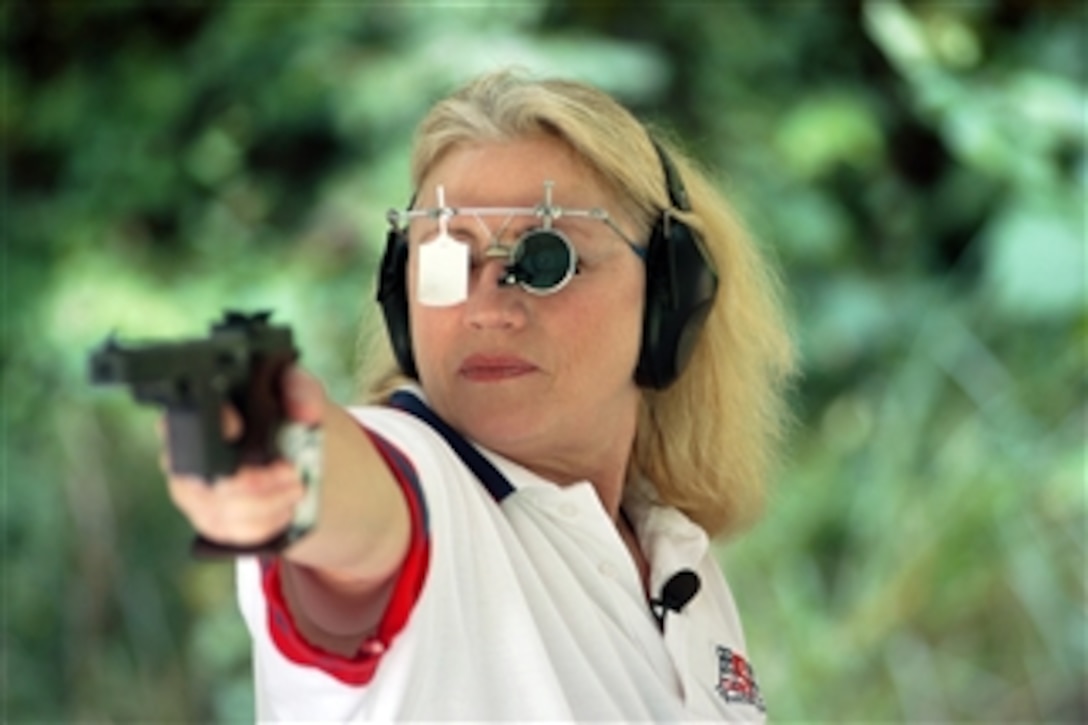 U.S. Army Reserve Staff Sgt. Elizabeth Callahan competes in her fourth Olympics in the women's 25-meter sport pistol event during the 2008 Olympic Games in Beijing, China, on Aug. 13, 2008.  