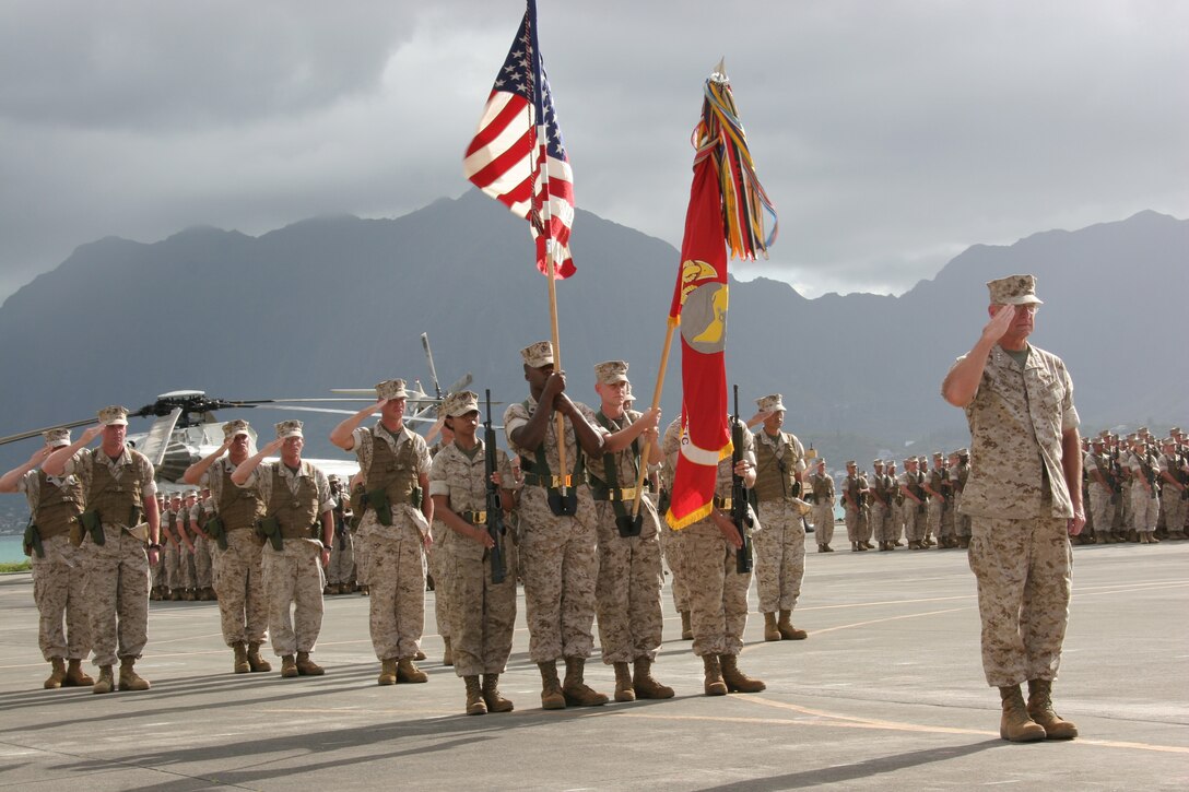Lt. Gen. John F. Goodman, commander, U.S. Marine Corps Forces, Pacific, salutes Gen. James T. Conway, Commandant of the Marine Corps, during a change of command and retirement ceremony on the flightline here Aug. 22.  Goodman relinquished command of MarForPac and retired after 41 years of military service.