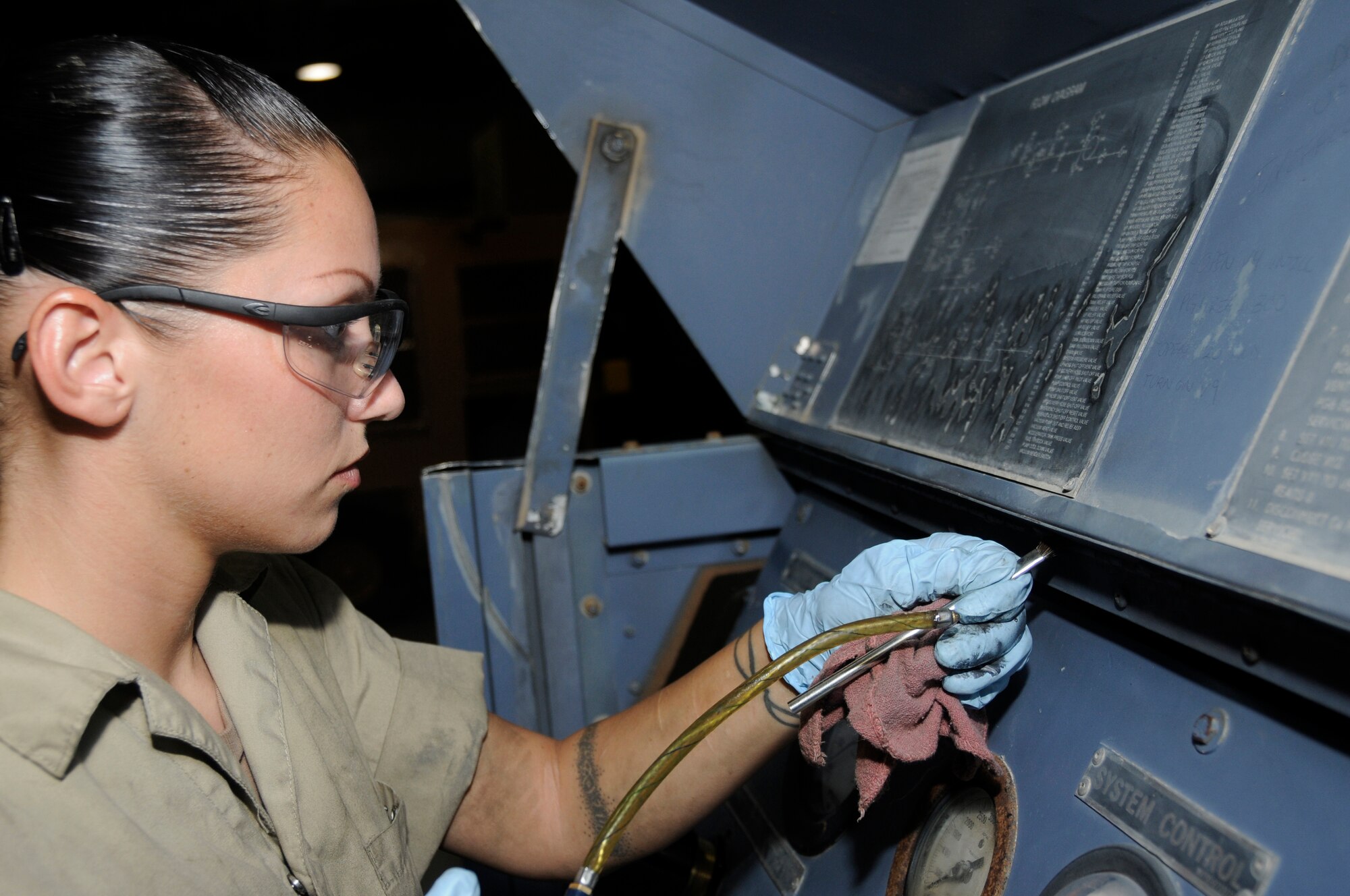 Staff Sgt. Elaina Bagnato, aerospace ground equipment maintainer assigned to the 379th Expeditionary Maintenance Squadron, applies lubricant to a liquid nitrogen cart Aug. 23, 2008, at an undisclosed air base in Southwest Asia. Sergeant Bagneto is responsible for maintaining equipment required to support Air Force aircraft while on the tarmac. Sergeant Bagneto, a native of Ventura, Calif., is deployed from Grand Forks Air Force Base, N.D., in support of Operations Iraqi Freedom, Enduring Freedom and Joint Task Force-Horn of Africa. (U.S. Air Force photo by Staff Sgt. Darnell T. Cannady/Released)