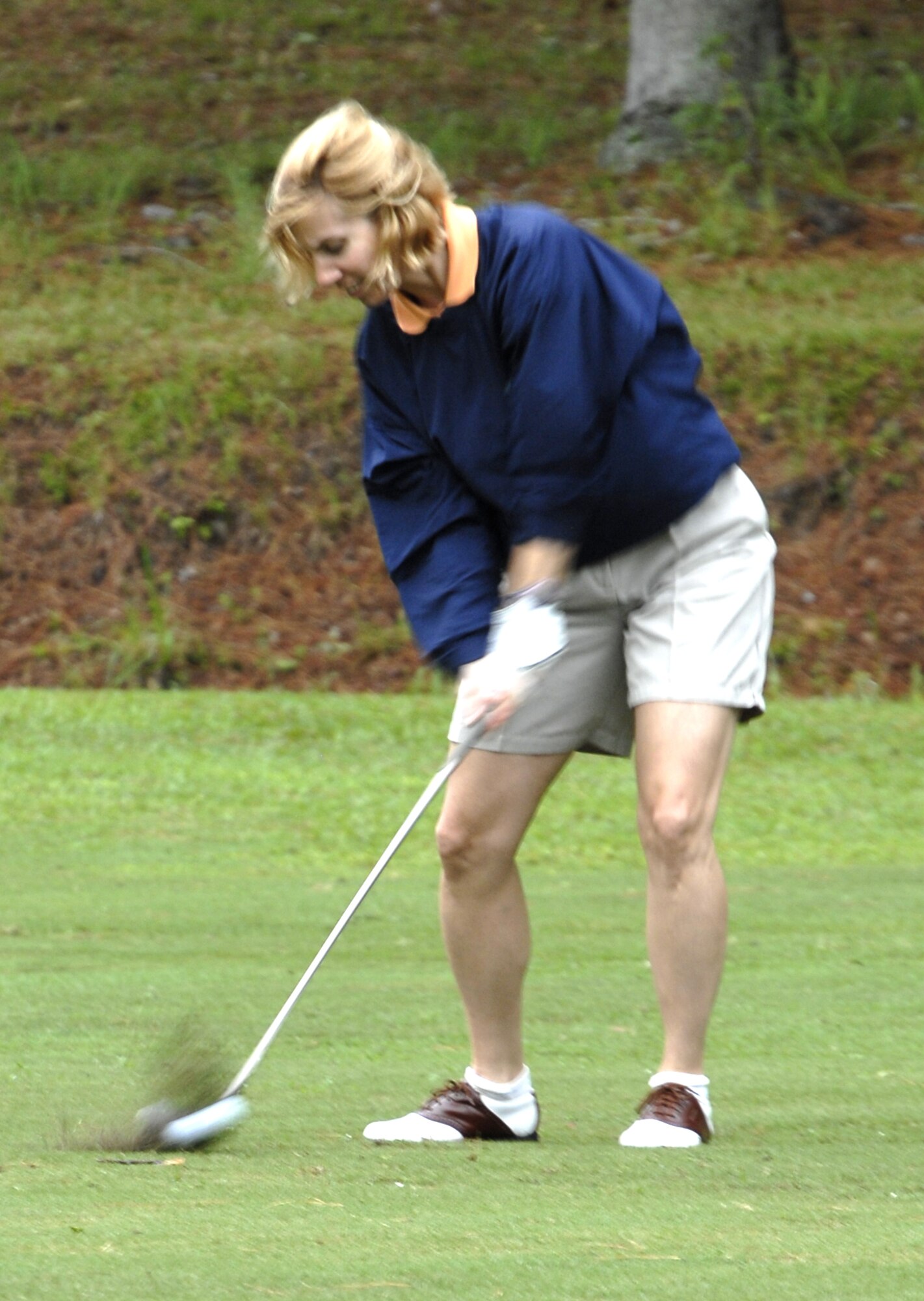 Lt. Col. Susan Ferrera hits her approach shot to the 18th hole during the Air Force Ball golf tournament at Miller Golf Club in Summerville, S.C., Aug. 22. The tournament was held to raise money for the annual ball to be held Sept. 6. Tickets are still available at the 437th Airlift Wing Protocol Office for $35 a person. For more information call protocol at 963-8002. Colonel Ferrera is the 437th Mission Support Group deputy commander. (U.S.  Air Force photo/Master Sgt. Sean Houlihan)