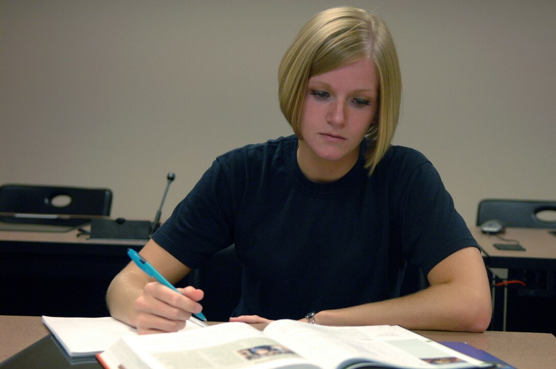 Senior Airman Allison Kornbau, 28th operations Support Squadron air traffic controller, is among the first of Ellsworth Airmen to take advantage of the classes available through Embry Riddle Aeronautical University, which started offering classes here Aug. 11. Registration for the next semester of classes is Sept. 29 through Oct. 17; semester starts Oct. 20. For more information visit www.embryriddle.edu/ellsworth or call (605) 923-6291. (U.S. Air Force photo/Tech. Sgt. Shanda L. De Anda)