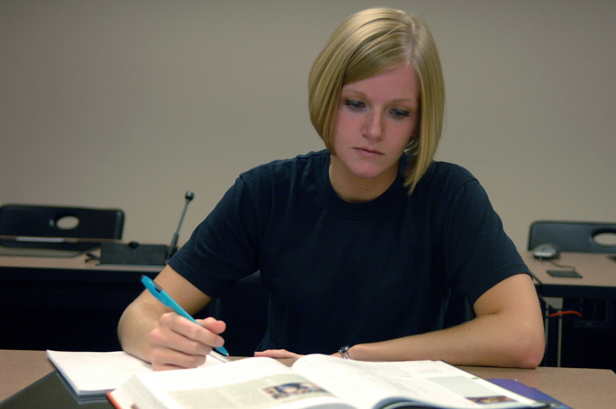 Senior Airman Allison Kornbau, 28th operations Support Squadron air traffic controller, is among the first of Ellsworth Airmen to take advantage of the classes available through Embry Riddle Aeronautical University, which started offering classes here Aug. 11. Registration for the next semester of classes is Sept. 29 through Oct. 17; semester starts Oct. 20. For more information visit www.embryriddle.edu/ellsworth or call (605) 923-6291. (U.S. Air Force photo/Tech. Sgt. Shanda L. De Anda)