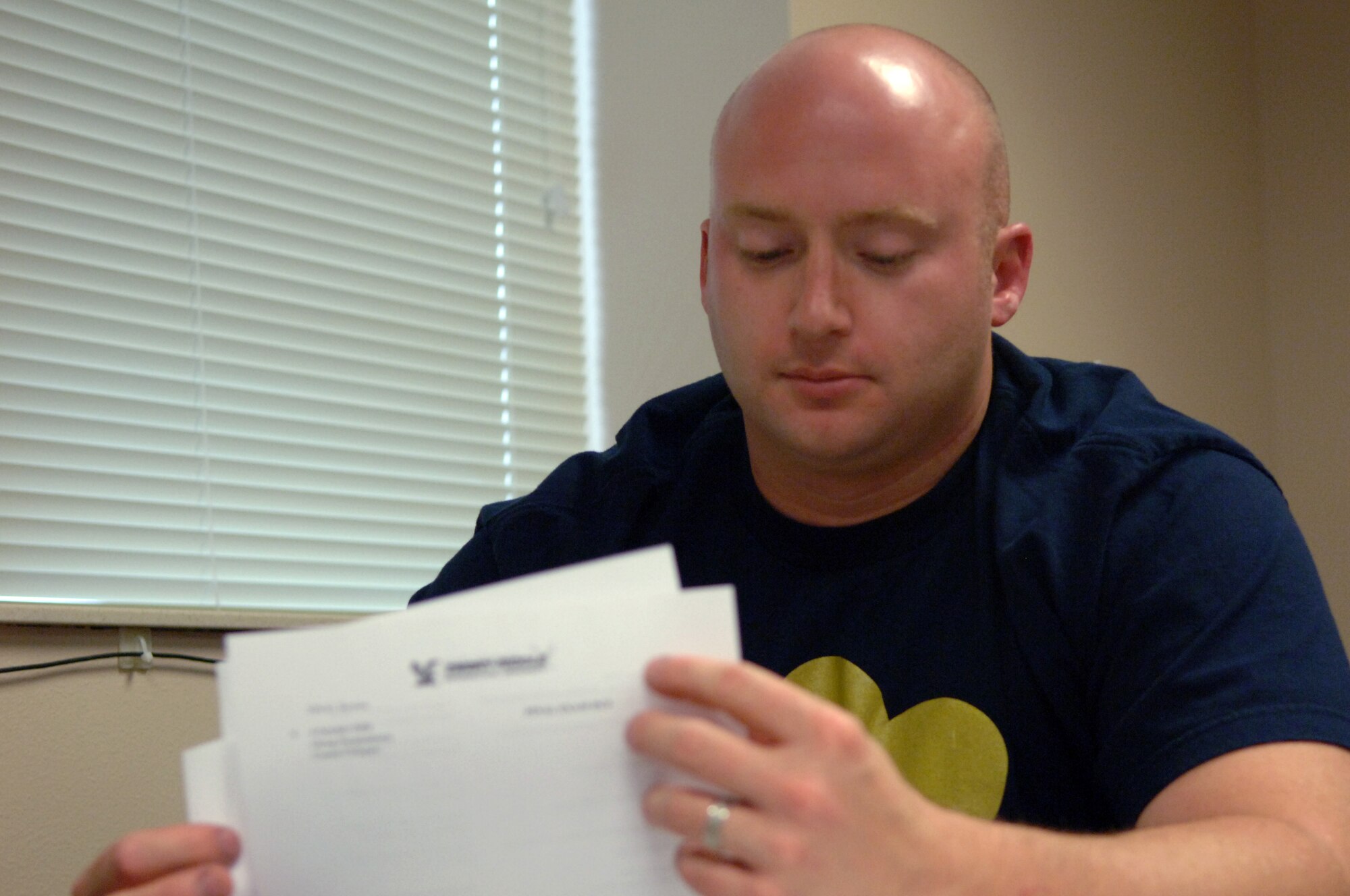 Senior Airman Nathan Geno, 28th Maintenance Squadron aerospace ground equipment technician, reviews course material prior to the start of his Organizational Behavior class Aug. 19 as part of Embry Riddle Aeronautical University offerings this semester. Embry Riddle is the newest educational institution that helps Ellsworth Airmen meet their educational goals. For more information, visit www.embryriddle.edu/ellsworth or call (605) 923-6291. (U.S. Air Force photo/Tech. Sgt. Shanda L. De Anda)