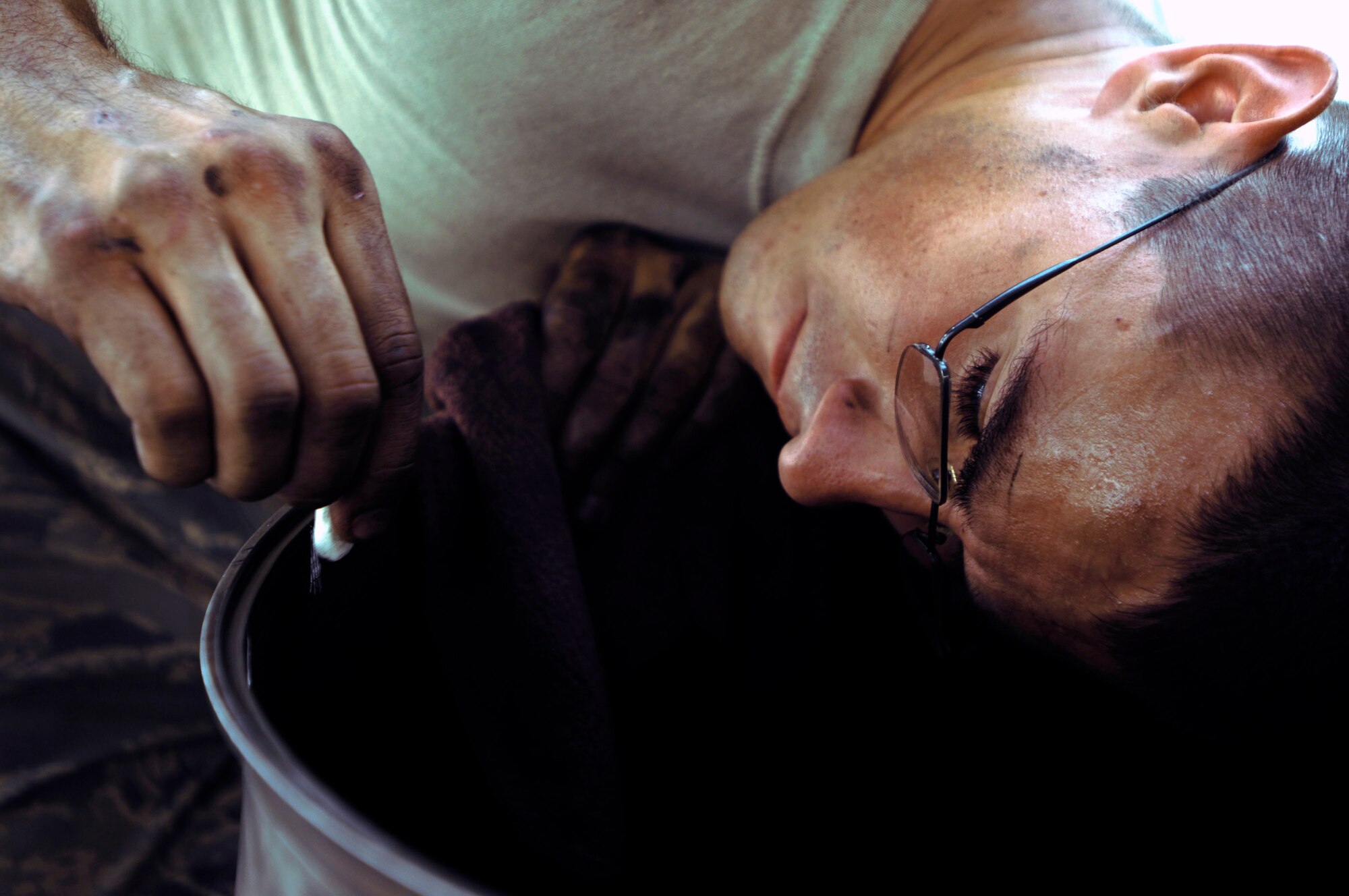 Senior Airman Sean Sweeney marks a crack found on the rear bearing support on a C-130 Hercules engine during a post-flight inspection Aug. 22 at Joint Base Balad, Iraq. Airman Sweeney is an aerospace propulsion technician with the 777th Expeditionary Aircraft Maintenance Squadron deployed from Little Rock Air Force Base, Ark. His hometown is Columbia, N.J. (U.S. Air Force photo/Airman 1st Class Jason Epley) 
