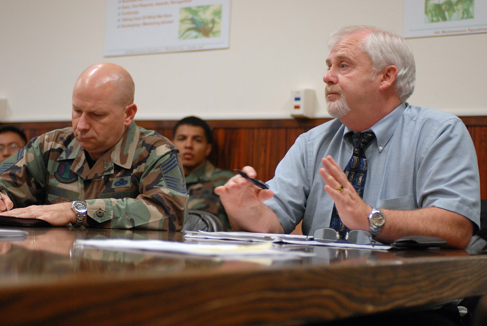 Giles Smay speaks to members of the 8th Maintenance Squadron Aug. 20 at Kunsan Air Base, South Korea. The study focused on Airmen with extra duties and how it affects their jobs. Mr. Smay is with the Air Force Manpower Agency. (U.S. Air Force photo/Senior Airman Gustavo Gonzalez) 
