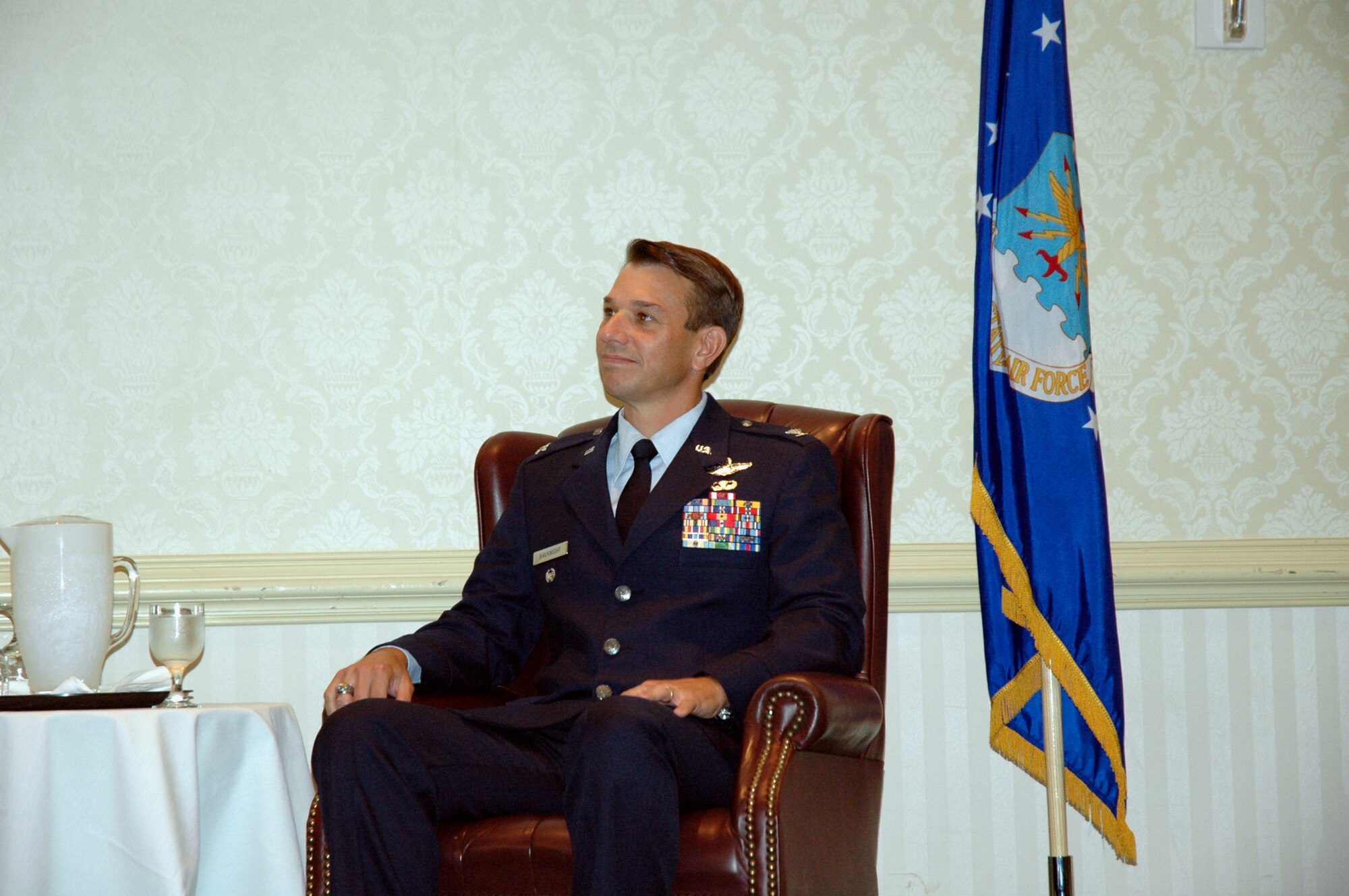 Colonel Mark Bauknight, 315th Airlift Wing Vice Commander listens as Chief Master Sergeant (Ret) Charlie Hall presides over his ceremony.  Col. Bauknight retires after 23 years of military service. (U.S. Air Force photo/Staff Sgt. Jeff Kelly)