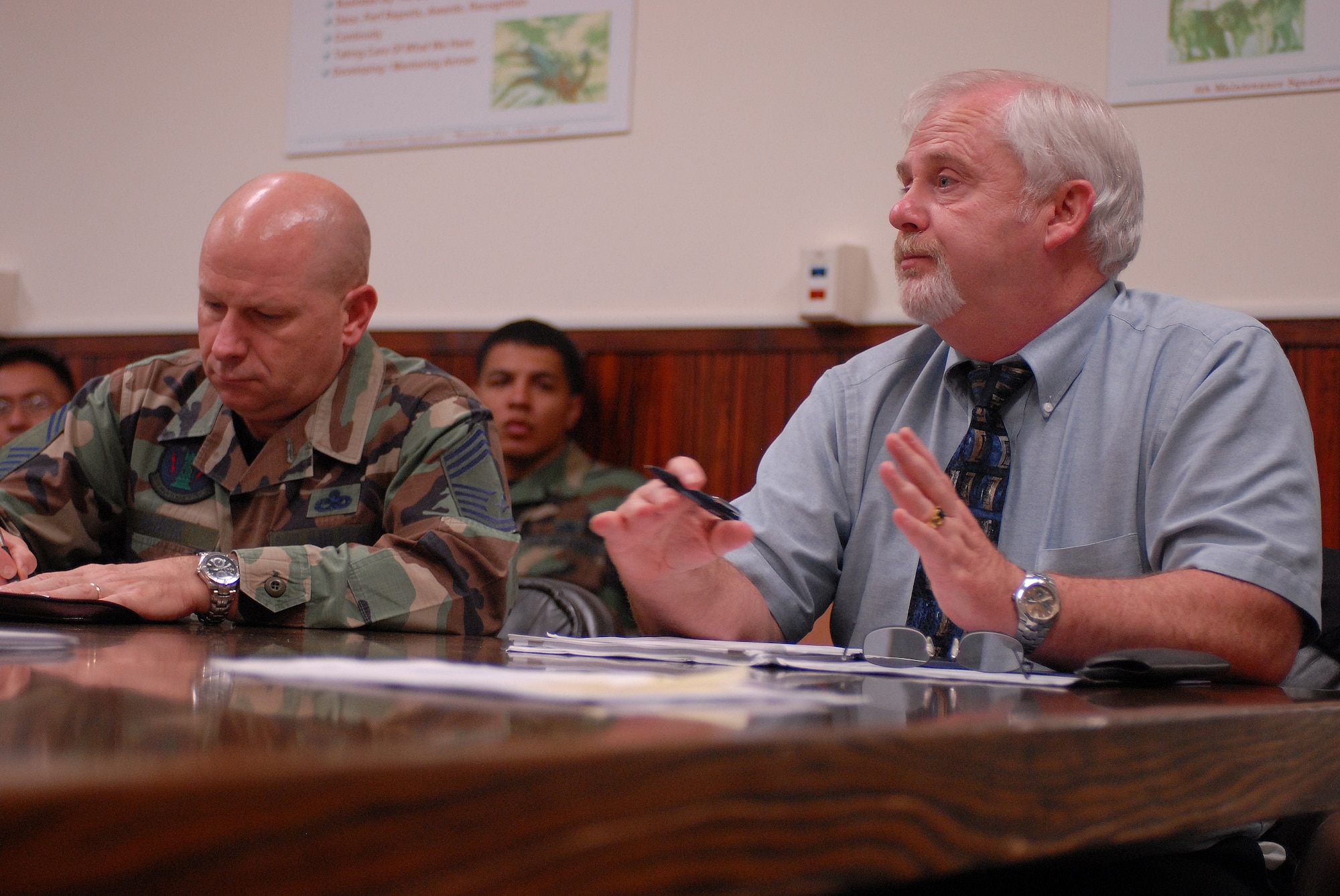 KUNSAN AIR BASE, Republic of Korea -- Members of the Airmen's Time Task Force  speak to members of the 8th Maintenance Squadron here Aug. 20. The study focused on Airmen with extra duties and how it affects their jobs. (U.S. Air Force photo/Senior Airman Gustavo Gonzalez) 