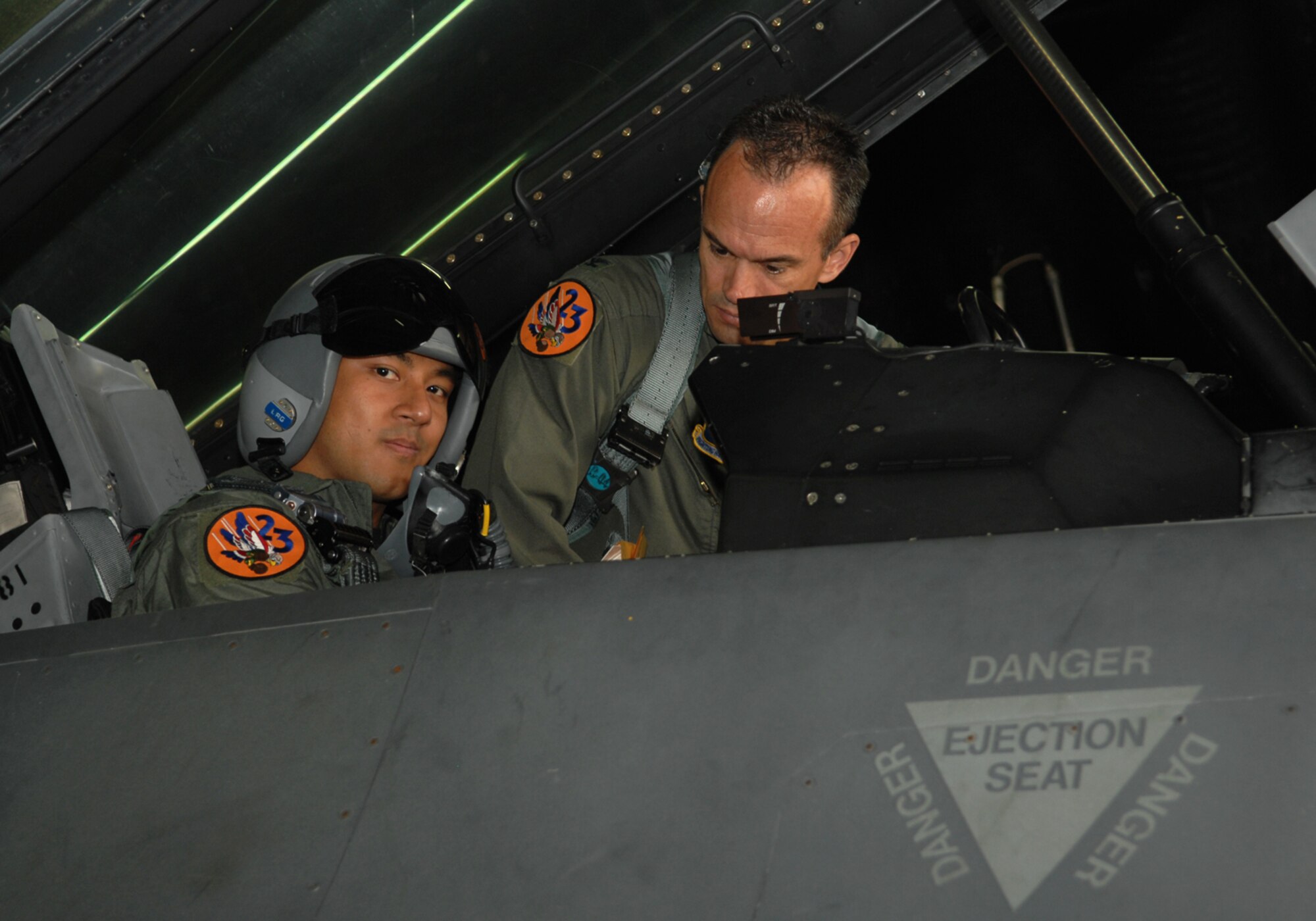 SPANGDAHLEM AIR BASE, Germany – Colonel Scott Bowen from the 52nd Operations Group prepares to give Airman 1st Class Henry Matsouka an incentive flight on Aug. 22, 2008.  A1C Matsouka was awarded the incentive flight by winning airman of the quarter for all of his hard work and dedication in the 52nd Operation Support Squadron.  (U.S. Air Force photo by Airman 1st Class Allen Pollard)