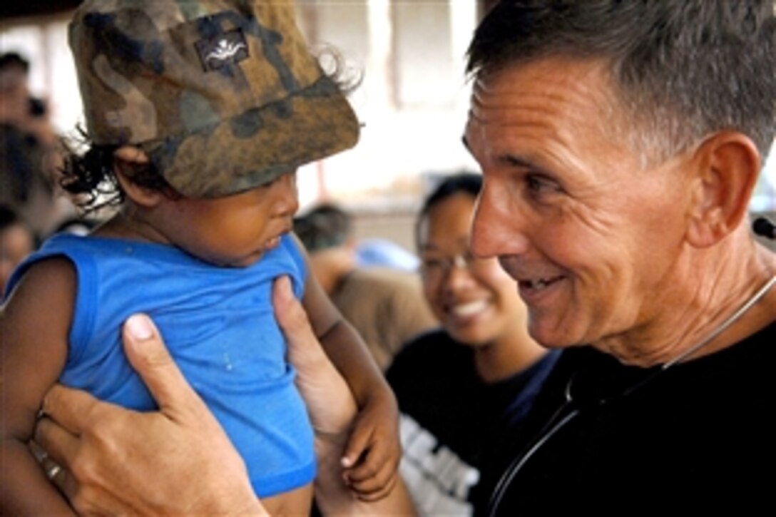 U.S. Navy Lt. Cmdr. Paul Wickard, a U.S. Public Health Service physician's assistant traveling with the amphibious assault ship USS Kearsarge, examines a child during the Caribbean phase of Continuing Promise 2008 in Yulu, Nicaragua, Aug. 23, 2008. This is an equal-partnership mission between the United States, Canada, Dominican Republic, Trinidad, Tobago and Guyana. 