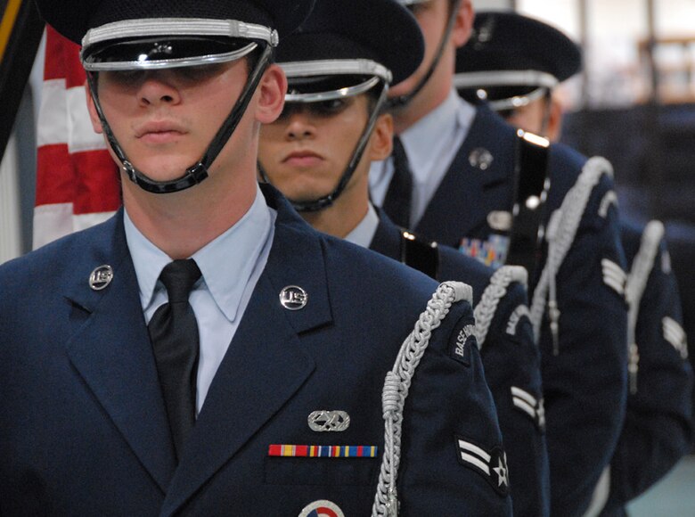 Members of the Eglin Air Force Base Honor Guard wait to present the colors at the  84th Test and Evaluation Squadron activation ceremony Aug 26 at the Air Armament Museum.  The 84 TES is the newest and only reserve squadron in the 53d Wing.  The squadron members fill regular Air Force positions within the wing's various units but report back to their reserve squadron.  The squadron is scheduled to have 18 members by year's end and 56 by 2012.  Photo by Staff Sgt. Samuel King Jr.