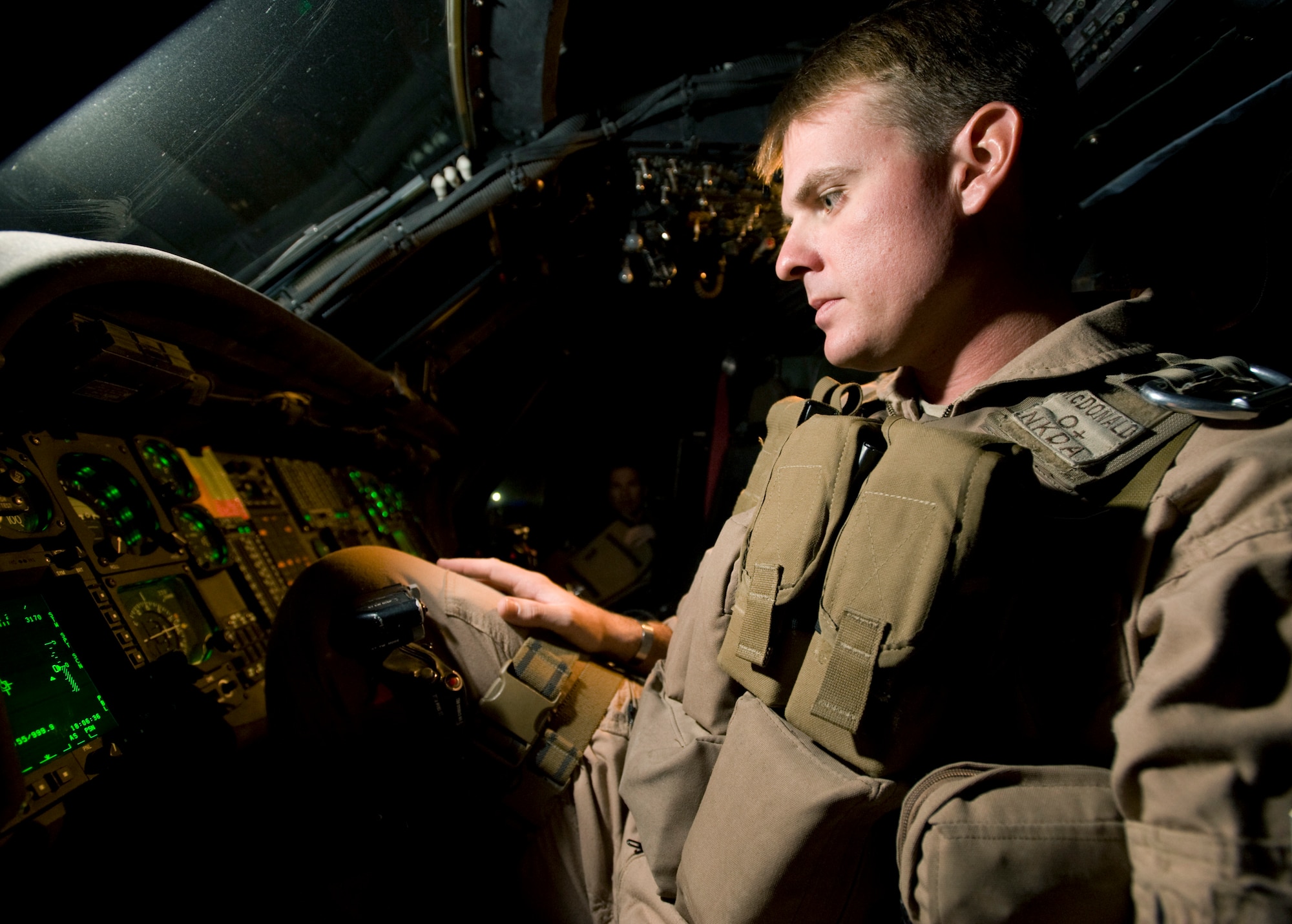 1st Lt. Brough McDonald preflights an HH-60 Pave Hawk before his aircrew begins its shift on alert Aug. 13 at Kandahar Air Base, Afghanistan. Lieutenant McDonald is a rescue pilot for the 305th Expeditionary Rescue Squadron from Davis-Mothan Air Force Base, Ariz. (U.S. Air Force photo/Master Sgt. Keith Brown) 
