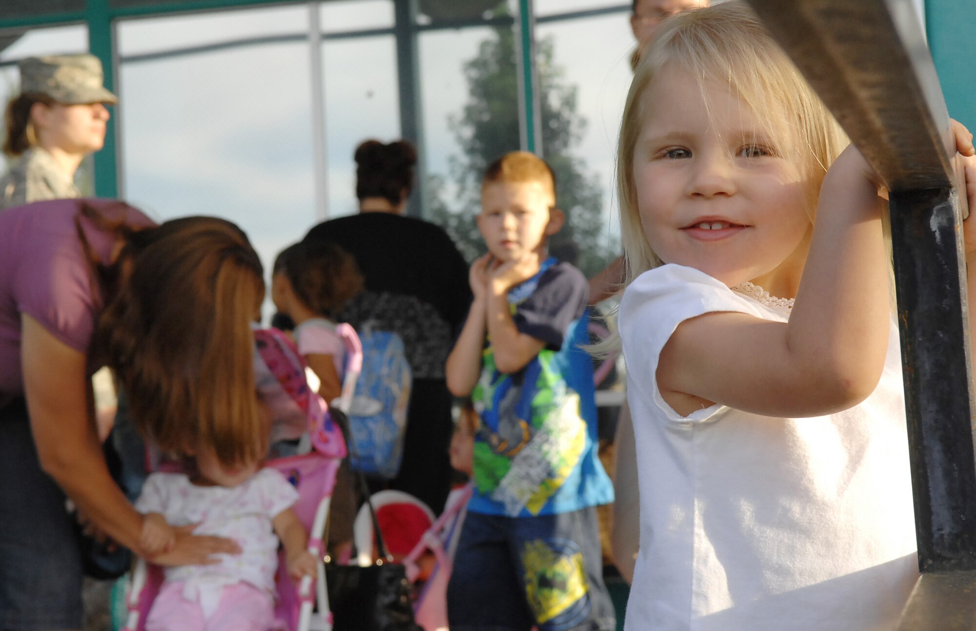 MOUNTAIN HOME AIR FORCE BASE, Idaho - Ryle Carley plays on the railing outside of the Base Primary School Aug. 25, the first day of school for the 2008-2009 school year on Mountain Home Air Force Base. (U.S. Air Force photo/ Airman Deborah Young)