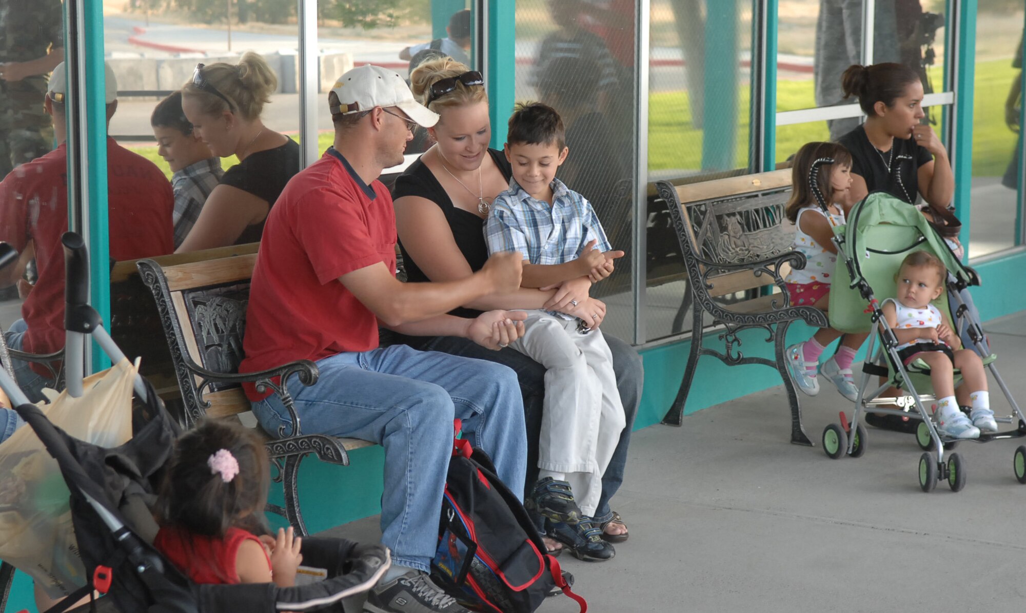 MOUNTAIN HOME AIR FORCE BASE, Idaho -- Families await the first bell on the first day of school at the Base Primary School Aug. 25. The emotions on the faces of the children were mixed as they awaited the opportunity to continue their education. Many looked anxious, nervous and apprehensive, but some were actually excited about the experience, according to their parents. (U.S. Air Force photo/Airman Deborah Young)