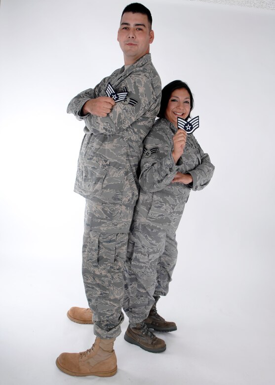 Senior Airmen John and Sonia Vega show off their new staff sergeant stripes after the testing results were released Aug. 20.  The Senior Airmen Vegas were high school sweet hearts who have been married for more than four years and have two sons. (U.S. Air Force photo by Airman 1st Class Joanna M. Kresge) 