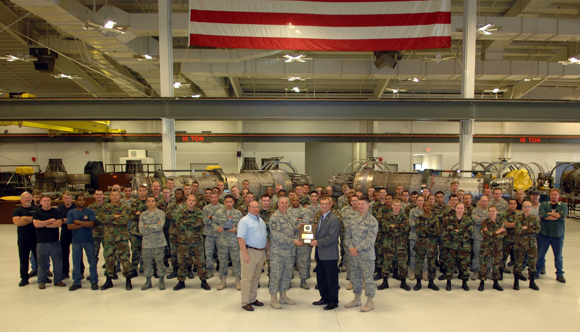 MOUNTAIN HOME AIR FORCE BASE, Idaho - The 366th Component Maintenance Squadron propulsion flight receives the Golden Wrench Award from the Pratt & Whitney aircraft engine company in a ceremony Aug. 15. The award was created in the late 1990s to recognize outstanding achievements in propulsion maintenance. (U.S. Air Force photo/ Airman 1st Class Ashley Winters) 