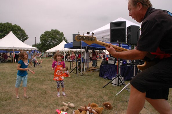 The Teddy Bear Band entertains reservist's children at the 934th Airlift Wing Family Day August 4.  More than 2000 people attended the annual event which provides information, entertainment and food for Reserve families. (Air Force Photo/Tech. Sgt. Jeff Williams)