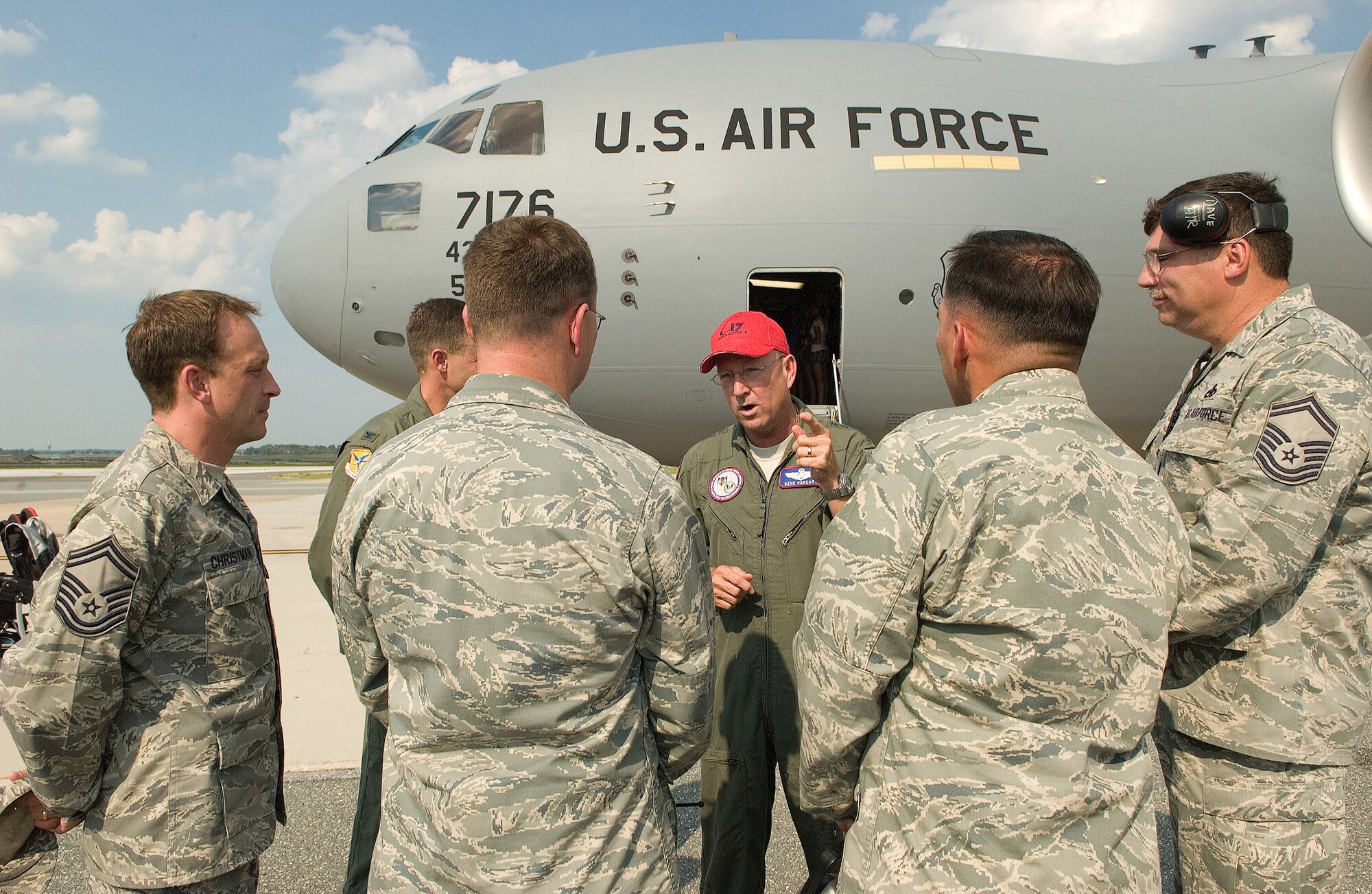 Gen. Victor Renuart Jr., commander of the North American Aerospace Defense Command and U.S. Northern Command at Peterson Air Force Base, Colo., speaks with Dover Airmen after delivering the 11th C-17 Globemaster III assigned to Dover Air Force Base Aug. 19. (U.S. Air Force photo/Jason Minto) 