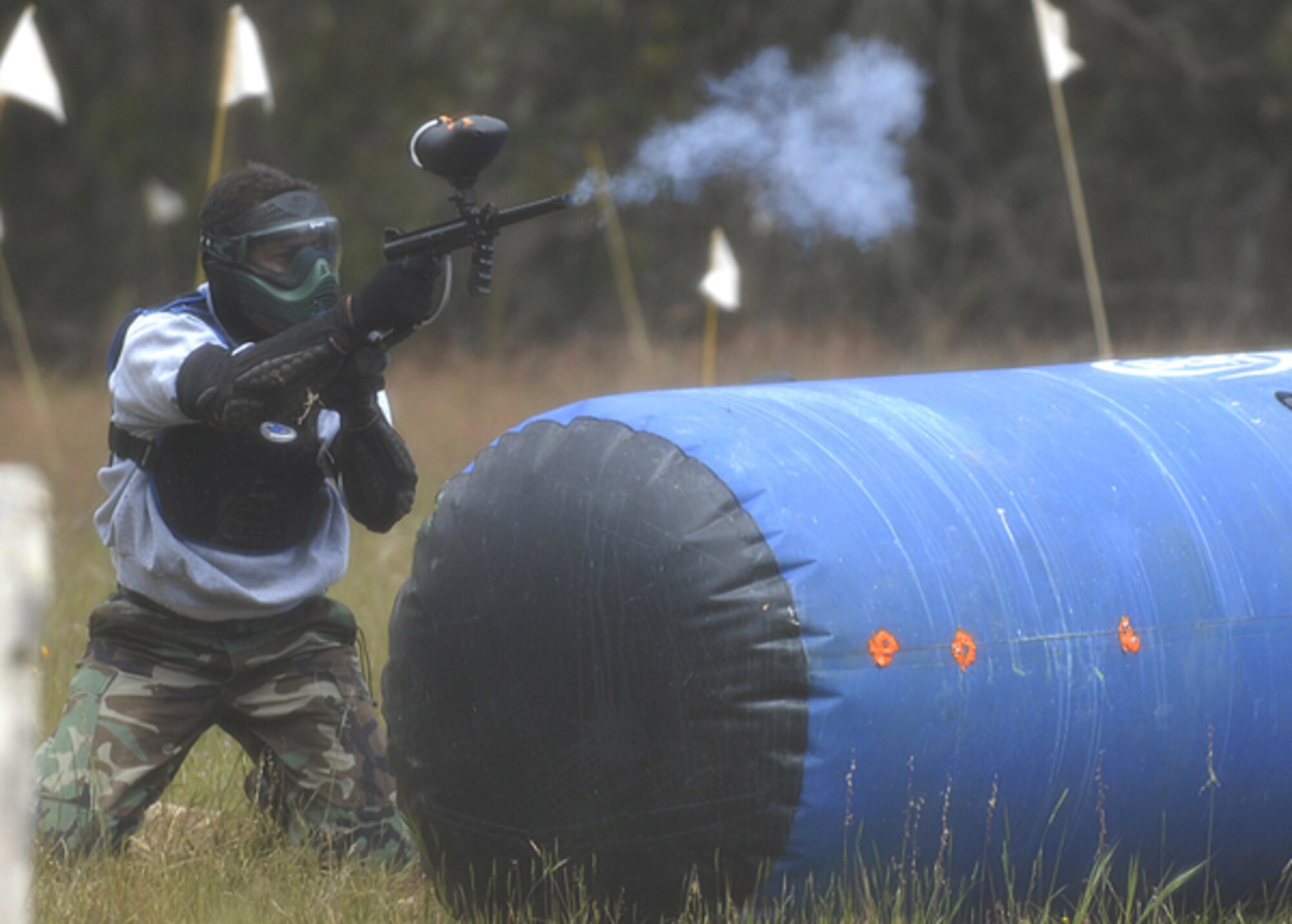 VANDENBERG AIR FORCE BASE, Calif. --  A member of the 30th Space Communications Sqsuadron wages war against another squadron at the base paint ball field. For more information on using the paint ball field contact outdoor recreation at 606-5908. (U.S. Air Force photo / Airman 1st Class Andrew Satran)