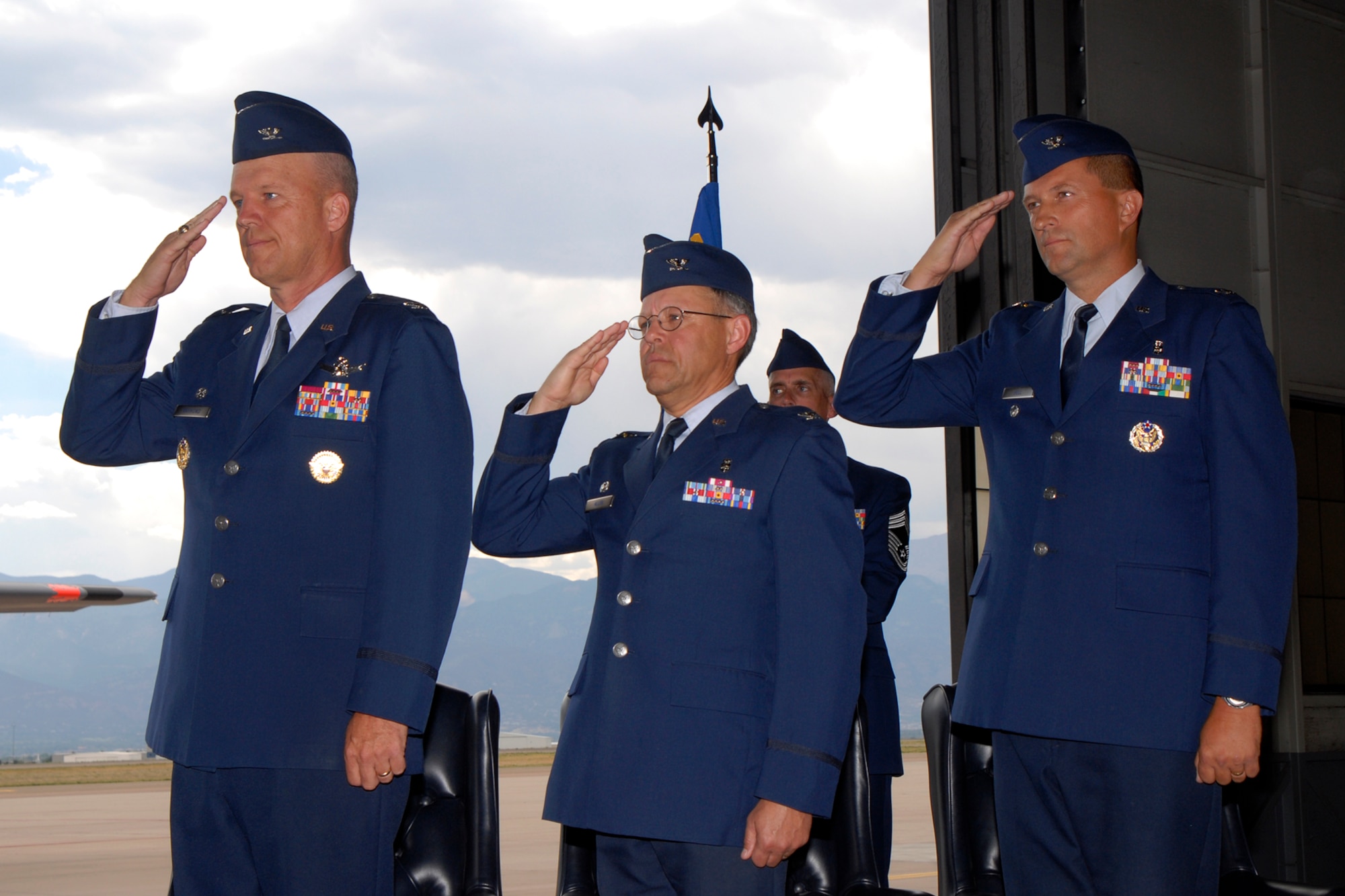 Col. John C. Sell assumed command of the 21st Medical Group from Col. Mark Allen during a ceremony on Aug. 1 at Peterson Air Force Base, Colo. Colonel Sell joins the 21st MDG from Air Force Space Command headquarters, where he was the Medical Support Division chief as well as the Command Administrator. Colonel Sell is board certified in healthcare administration and a Fellow in the American College of Healthcare Executives. He has held a variety of positions in the Air Force serving at the unit, major command, joint and also held two Air Staff-level positions at the Air Force Surgeon’s Office and at the Pentagon in the Air Force Directorate of Programs. The 21st MDGs’ outgoing commander, Colonel Allen, moves to Malcolm Grove Medical Center at Travis AFB, Calif., where he will serve as the hospital’s administrator. The ceremony was officiated by Col. Jay Raymond, 21st Space Wing commander. (U.S. Air Force photo/Craig Denton)