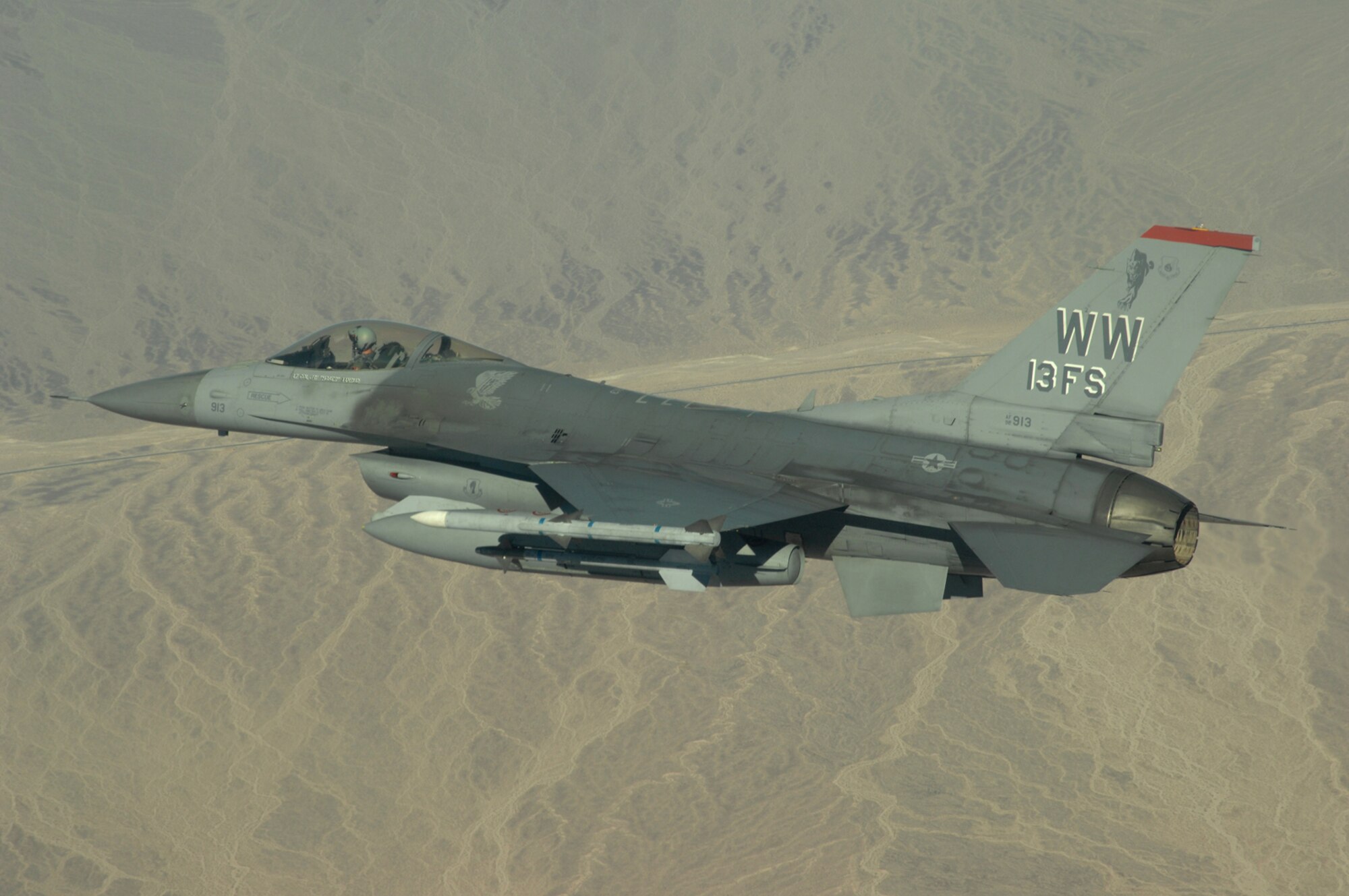 An F-16 from the 13th Fighter Squadron, Misawa Air Base, Japan, departs for the Nevada Test and Training Ranges, August 20, 2008, during exercise Green Flag 080-9 at Nellis Air Force Base, Nev. This training prepares U.S. forces to fight in a high-tech combat environment while providing Air Force leaders valuable planning experience.  Green Flag exercises use state-of-the-art technology to provide world class close air support counter land airpower training for Air Force, sister services, and international combat fighter, bomber, and airborne command and control squadrons stressing realistic combat environments focused on high desert armored warfare.  The exercise facilitates joint operational training at the U.S. Army National Training Center at Fort Irwin, Calif.  Green Flag also trains Air Force ground combat units in the tactical control of airpower in the close battle.  U.S. Army brigade commanders and their combat forces deployed to NTC receive the support and integrate the airpower.

 (U.S. Air Force photo/ Master Sgt. Kevin J. Gruenwald)