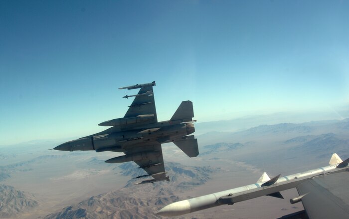 An F-16 from the 13th Fighter Squadron, Misawa Air Base, Japan, departs for the Nevada Test and Training Ranges, August 20, 2008, during exercise Green Flag 080-9 at Nellis Air Force Base, Nev. This training prepares U.S. forces to fight in a high-tech combat environment while providing Air Force leaders valuable planning experience.  Green Flag exercises use state-of-the-art technology to provide world class close air support counter land airpower training for Air Force, sister services, and international combat fighter, bomber, and airborne command and control squadrons stressing realistic combat environments focused on high desert armored warfare.  The exercise facilitates joint operational training at the U.S. Army National Training Center at Fort Irwin, Calif.  Green Flag also trains Air Force ground combat units in the tactical control of airpower in the close battle.  U.S. Army brigade commanders and their combat forces deployed to NTC receive the support and integrate the airpower.

 (U.S. Air Force photo/ Master Sgt. Kevin J. Gruenwald)