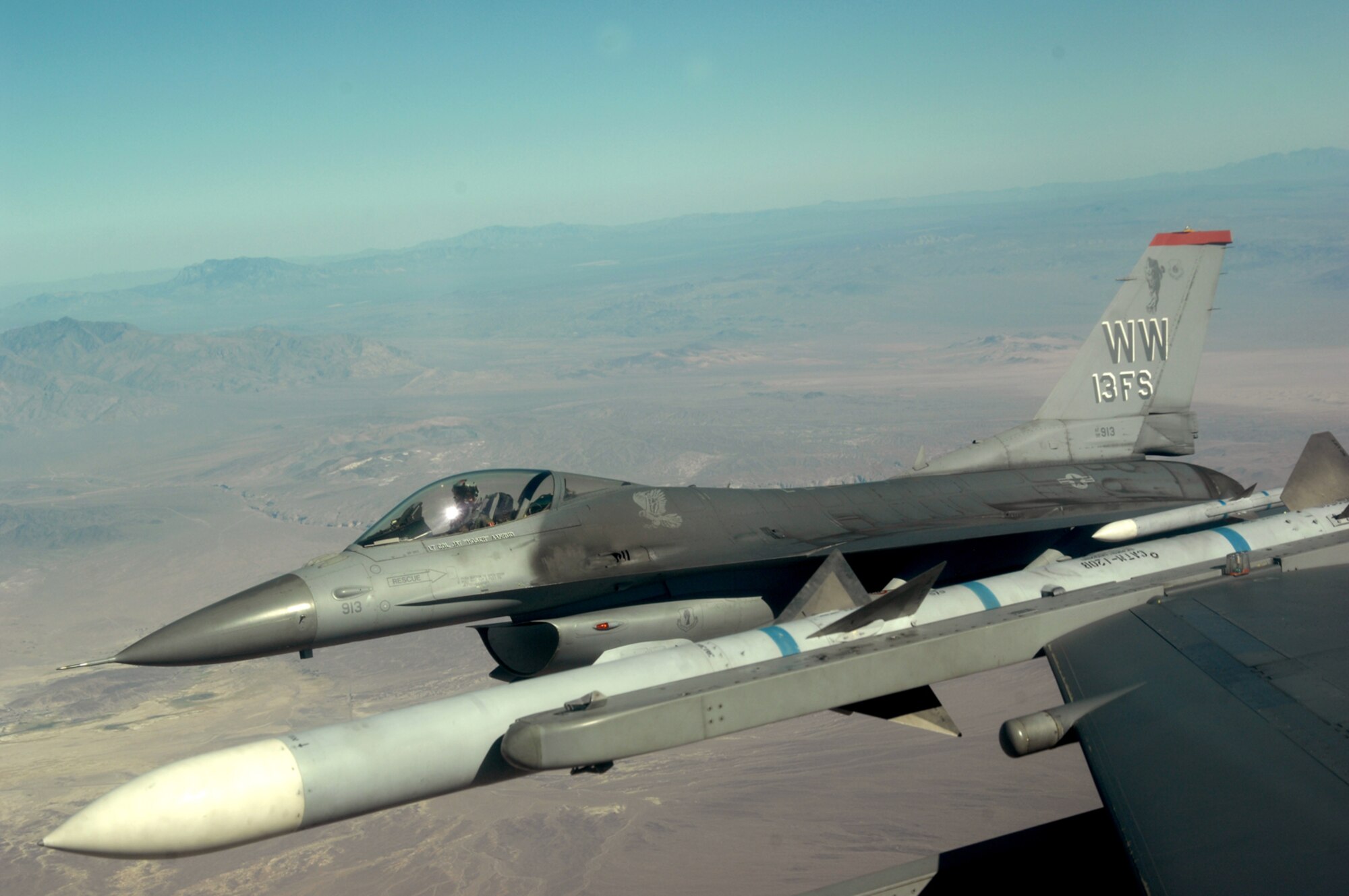 An F-16 from the 13th Fighter Squadron, Misawa Air Base, Japan, departs for the Nevada Test and Training Ranges, August 20, 2008, during exercise Green Flag 080-9 at Nellis Air Force Base, Nev. This training prepares U.S. forces to fight in a high-tech combat environment while providing Air Force leaders valuable planning experience.  Green Flag exercises use state-of-the-art technology to provide world class close air support counter land airpower training for Air Force, sister services, and international combat fighter, bomber, and airborne command and control squadrons stressing realistic combat environments focused on high desert armored warfare.  The exercise facilitates joint operational training at the U.S. Army National Training Center at Fort Irwin, Calif.  Green Flag also trains Air Force ground combat units in the tactical control of airpower in the close battle.  U.S. Army brigade commanders and their combat forces deployed to NTC receive the support and integrate the airpower.
 (U.S. Air Force photo/ Master Sgt. Kevin J. Gruenwald)