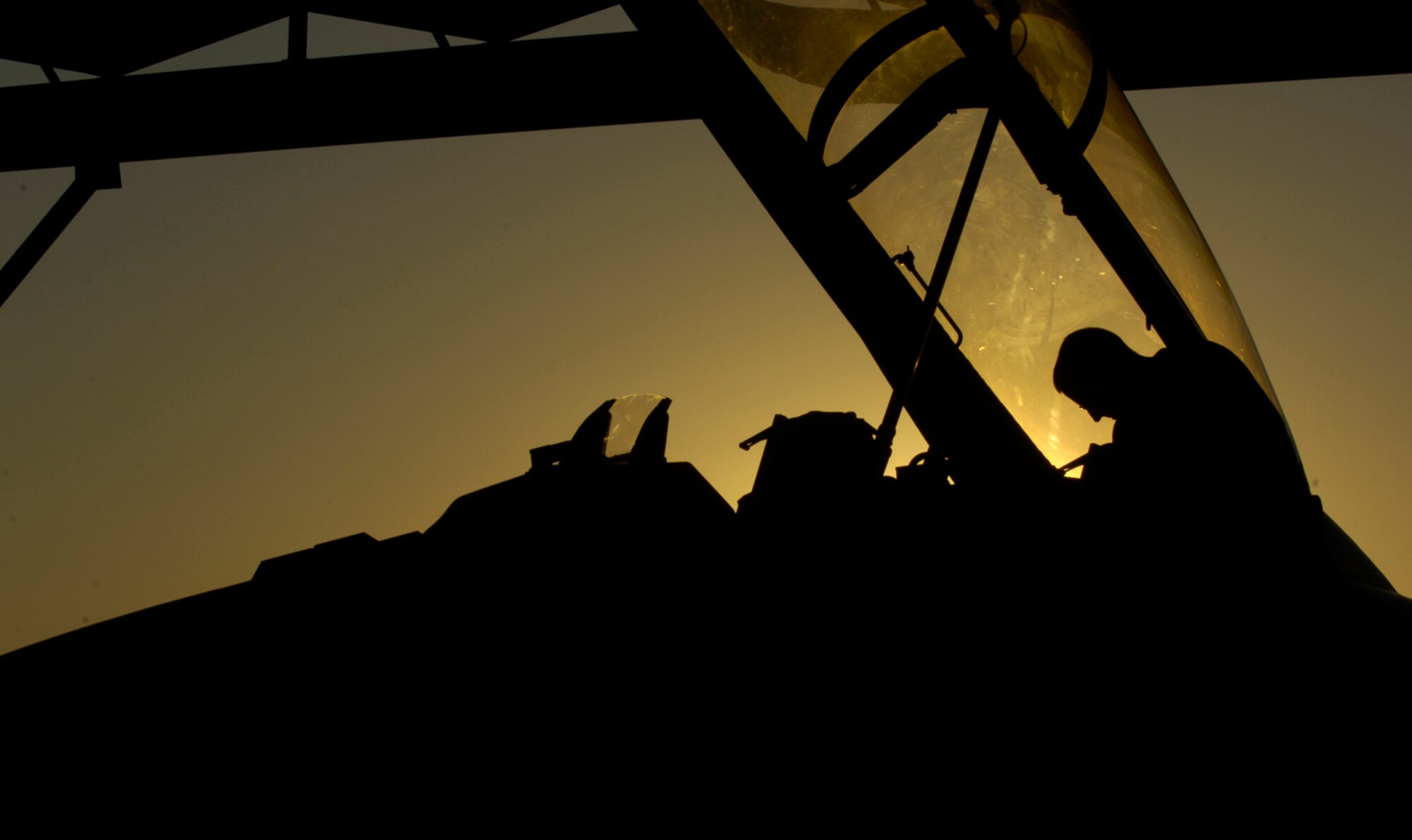 Airman First Class Rory Conway, crew chief, 13th Fighter Squadron, Misawa Air Base, Japan, conducts an F-16 post flight inspection August 21, 2008, during exercise Green Flag 080-9 at Nellis Air Force Base, Nev. This training prepares U.S. forces to fight in a high-tech combat environment while providing Air Force leaders valuable planning experience.  Green Flag exercises use state-of-the-art technology to provide world class close air support counter land airpower training for Air Force, sister services, and international combat fighter, bomber, and airborne command and control squadrons stressing realistic combat environments focused on high desert armored warfare.  The exercise facilitates joint operational training at the U.S. Army National Training Center at Fort Irwin, Calif.  Green Flag also trains Air Force ground combat units in the tactical control of airpower in the close battle.  U.S. Army brigade commanders and their combat forces deployed to NTC receive the support and integrate the airpower.
(U.S. Air Force photo/ Master Sgt. Kevin J. Gruenwald)