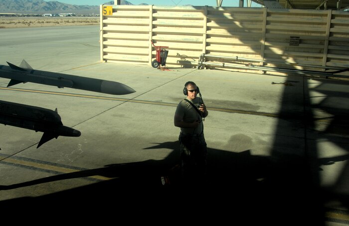 Tech. Sgt. Brian Spradling, avionics technician, 13th Fighter Squadron, Misawa Air Base, Japan, conducts an F-16 post flight inspection August 20, 2008, during exercise Green Flag 080-9 at Nellis Air Force Base, Nev. This training prepares U.S. forces to fight in a high-tech combat environment while providing Air Force leaders valuable planning experience.  Green Flag exercises use state-of-the-art technology to provide world class close air support counter land airpower training for Air Force, sister services, and international combat fighter, bomber, and airborne command and control squadrons stressing realistic combat environments focused on high desert armored warfare.  The exercise facilitates joint operational training at the U.S. Army National Training Center at Fort Irwin, Calif.  Green Flag also trains Air Force ground combat units in the tactical control of airpower in the close battle.  U.S. Army brigade commanders and their combat forces deployed to NTC receive the support and integrate the airpower.
(U.S. Air Force photo/ Master Sgt. Kevin J. Gruenwald)