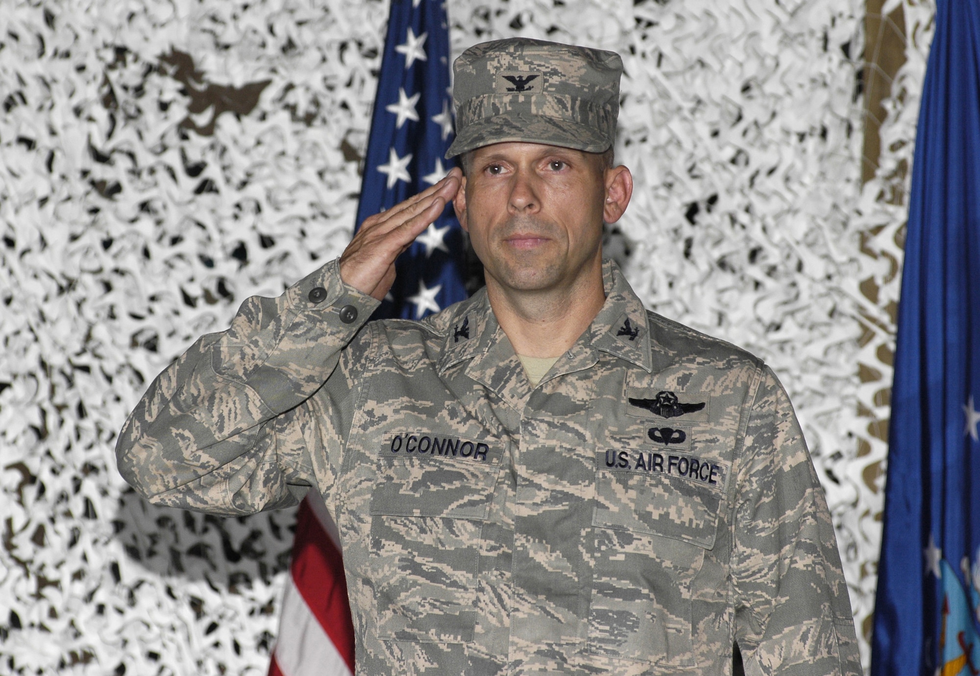 Col. Brian E. O'Connor returns his first salute to the 621st Contingency Response Wing during a change of command ceremony August 22. (U.S. Air Force photo/Carlos Cintron)
