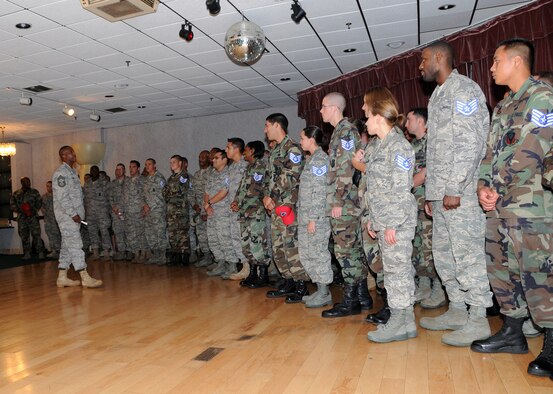 ANDERSEN AIR FORCE BASE, Guam - Team Andersen members receive praise from their peers during a promotion party Aug. 22 at the Top of the Rock here. The group of 147 senior airmen received a line number for promotion to staff sergeant. (U.S. Air Force photo by Airman 1st Class Courtney Witt)