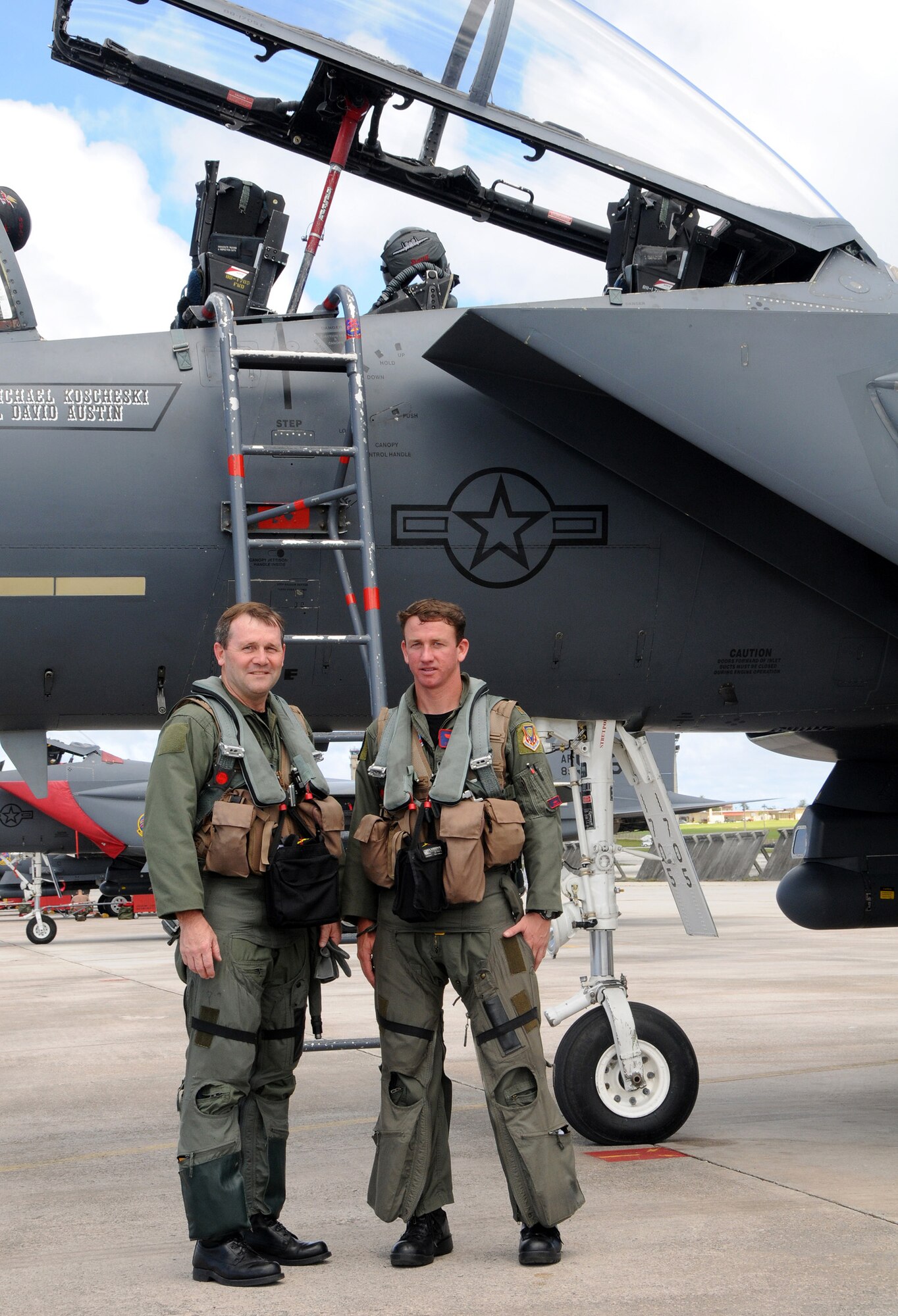 ANDERSEN AIR FORCE BASE, Guam - Brigadier Gen. Doug Owens, 36th Wing commander,and Major Christopher Ederle, 389th Fighter Squadron F-15E Strike Eagle Pilot, prepare for the generals final flight here Aug. 26. During his command, the 36th WG has seen numerous rotations of bombers, fighters, and tankers in support of operations in the Pacific. (U.S. Air Force photo by Airman 1st Class Courtney Witt)