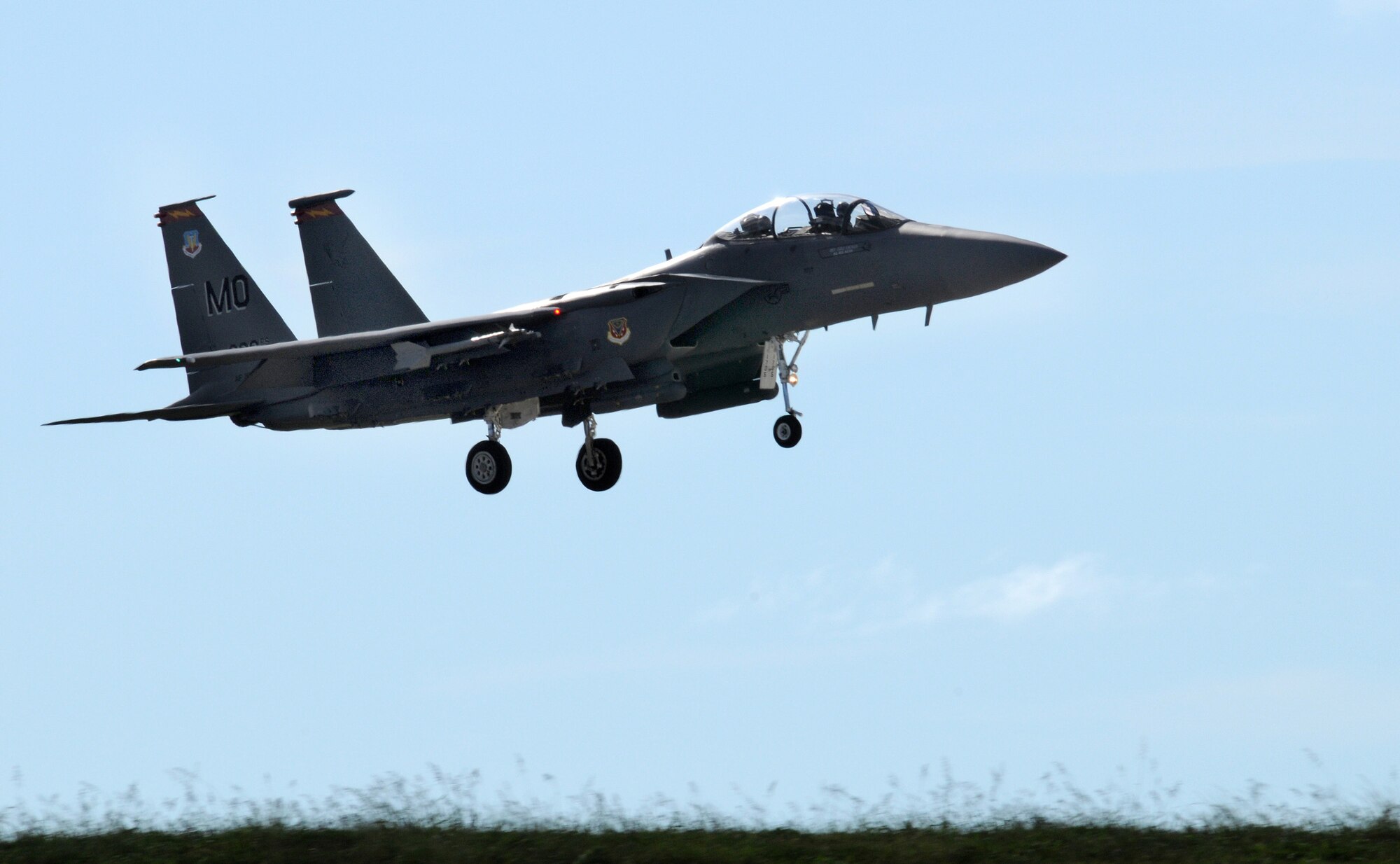 ANDERSEN AIR FORCE BASE, Guam - Brig. Gen. Doug Owens, 36th Wing commander,lands here after more than an hour flying over Guam and the Pacific Aug. 26. He flew in a F-15E Strike Eagle, one of many types of aircraft deployed here. (U.S. Air Force photo by Airman 1st Class Courtney Witt)
